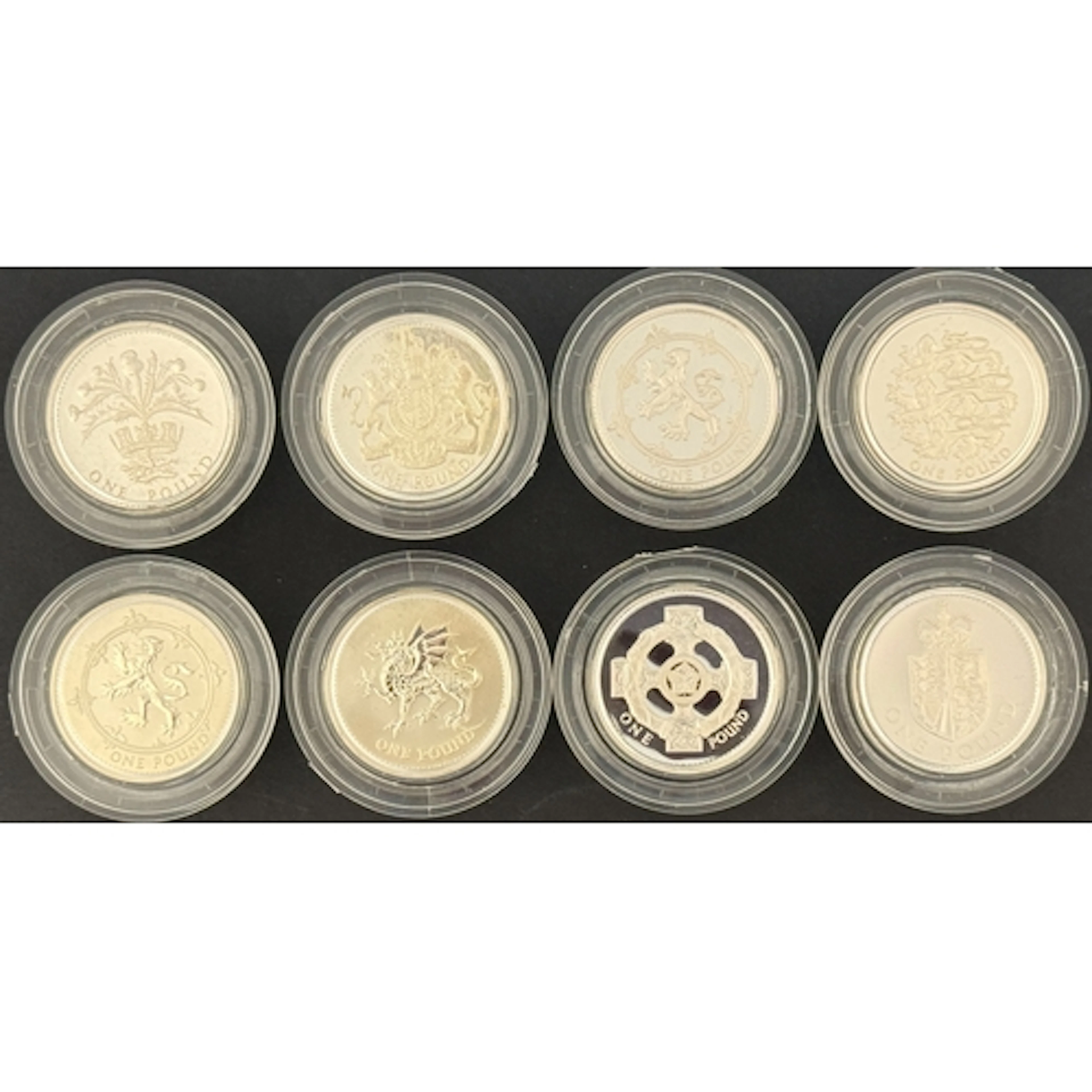 A group of eight UK QEII £1 silver proof coins, dated 1988, ...