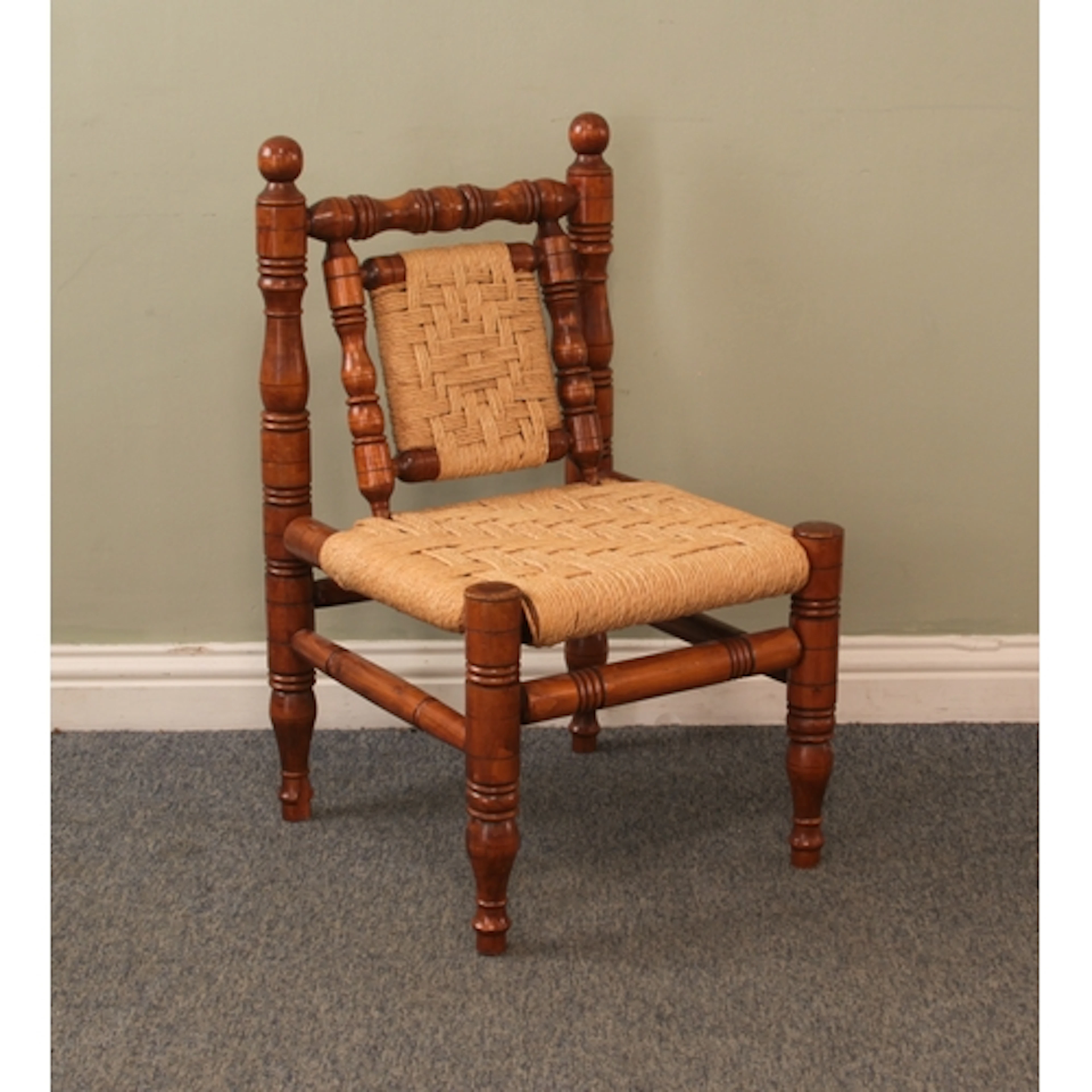 A modern turner's chair - with rush seat and back, 49cm wide...