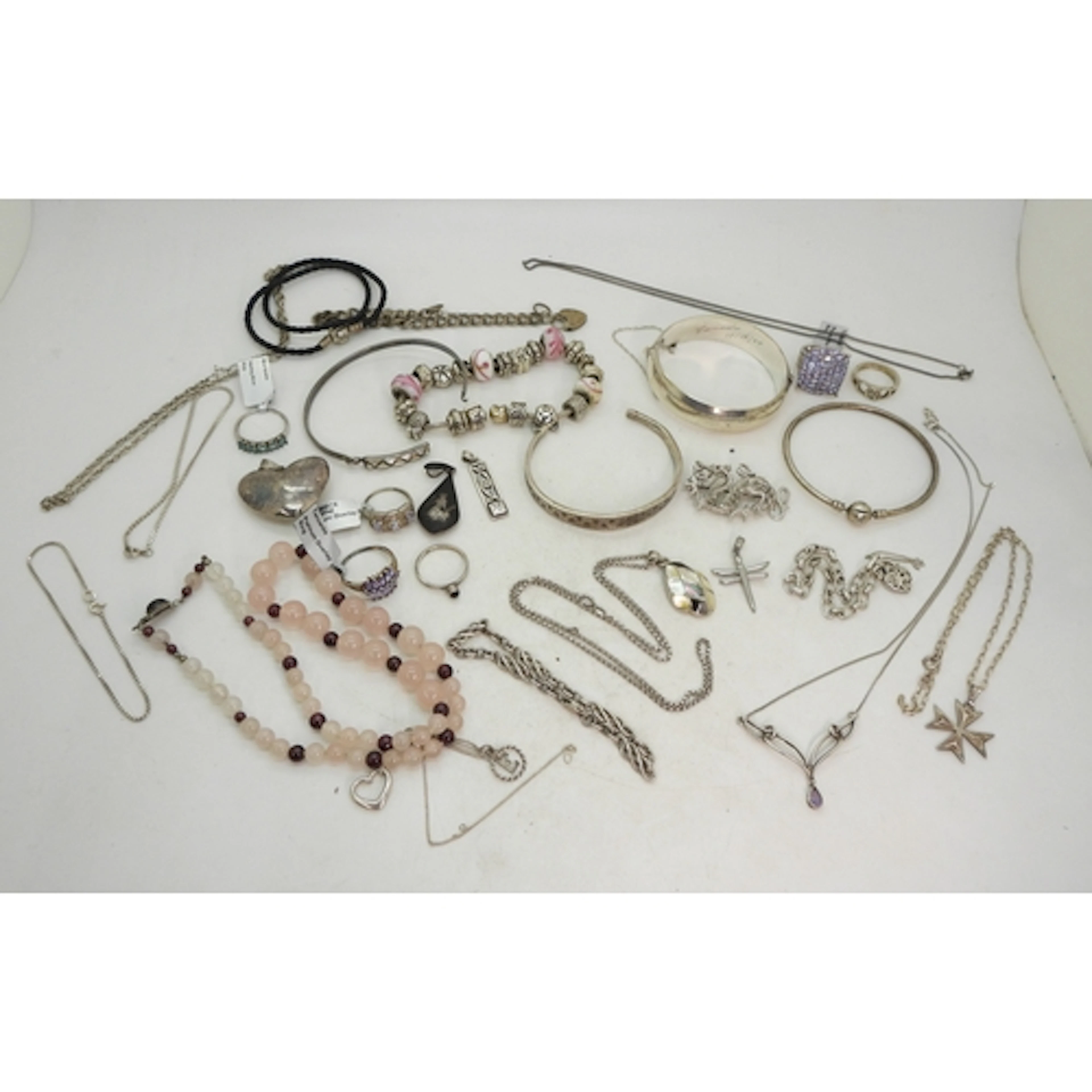 Silver bangles to include Pandora, and a leather thong neckl...