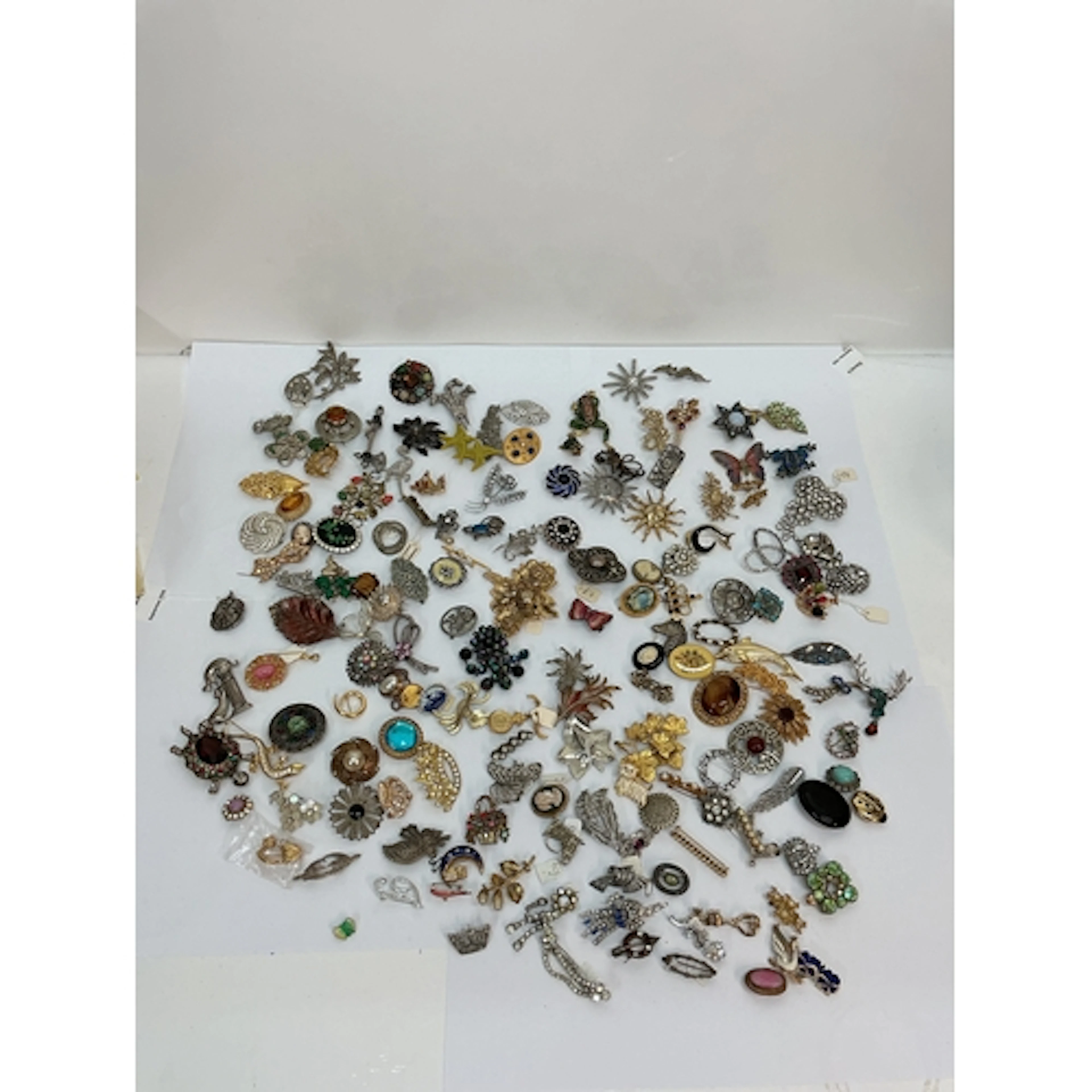 A large collection of vintage brooches including some signed...