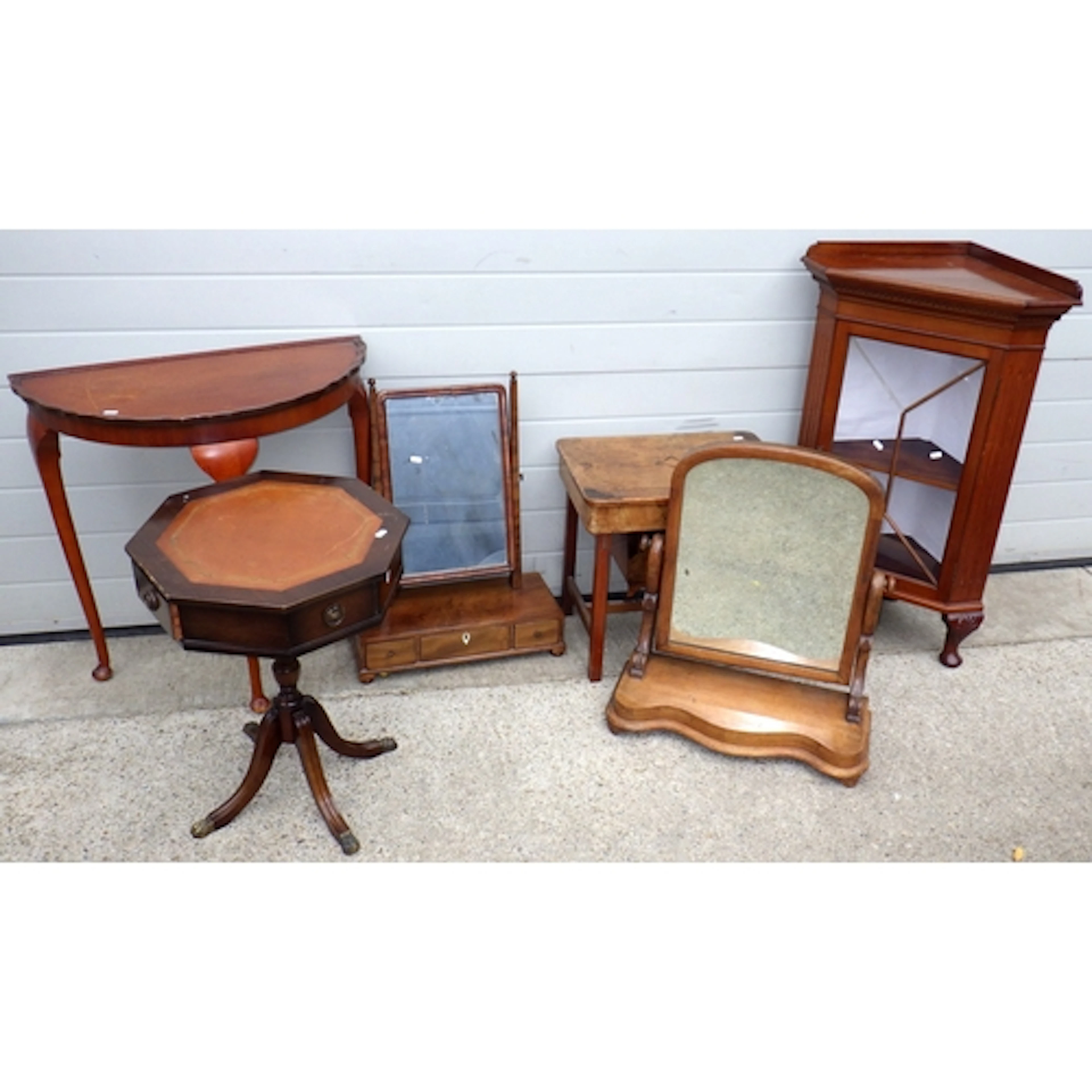 Two toilet mirrors, low corner cabinet, side table, octagona...