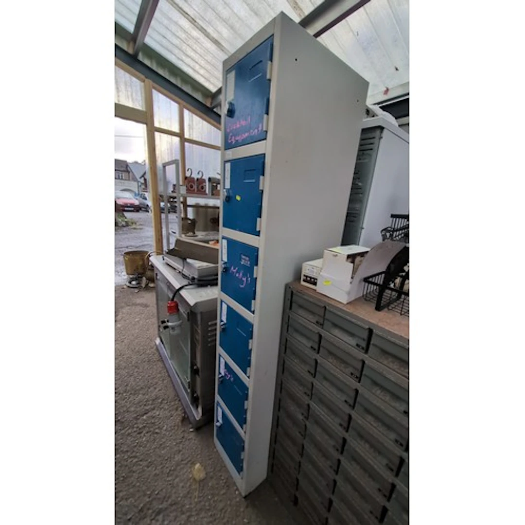 Atlas steel locker cabinet with a vertical arrangement of bl...