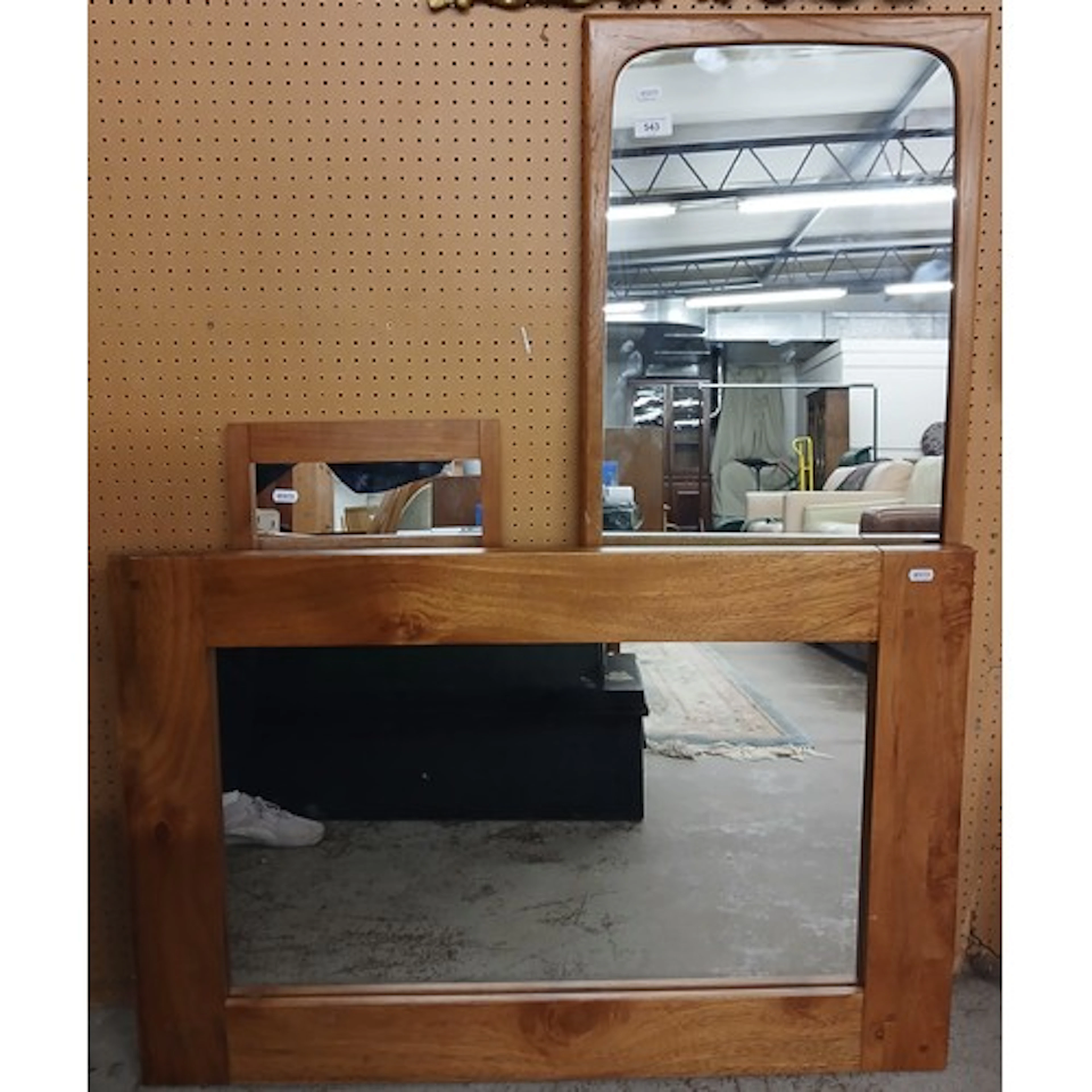 Two teak framed mirrors, and a pine framed mirror. (3)
