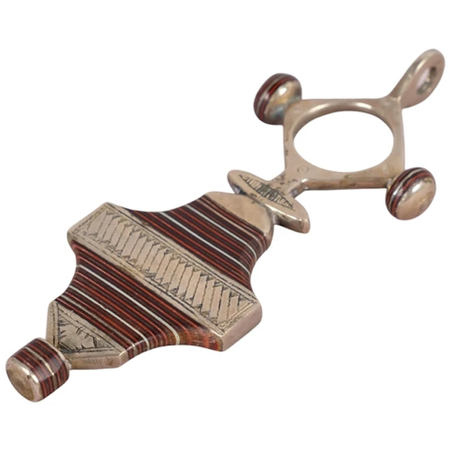 A Saharan silver plated ebony Tuareg Cross, unmarked, 11cm