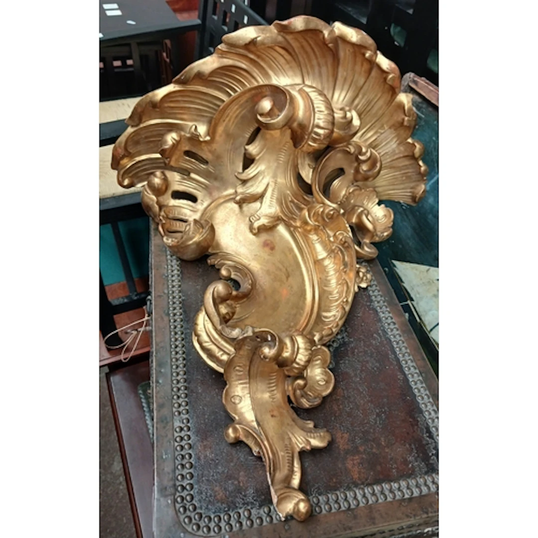 A 19th century gilt gesso Rococo style bracket.