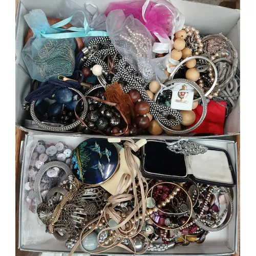 A box of assorted costume jewellery.