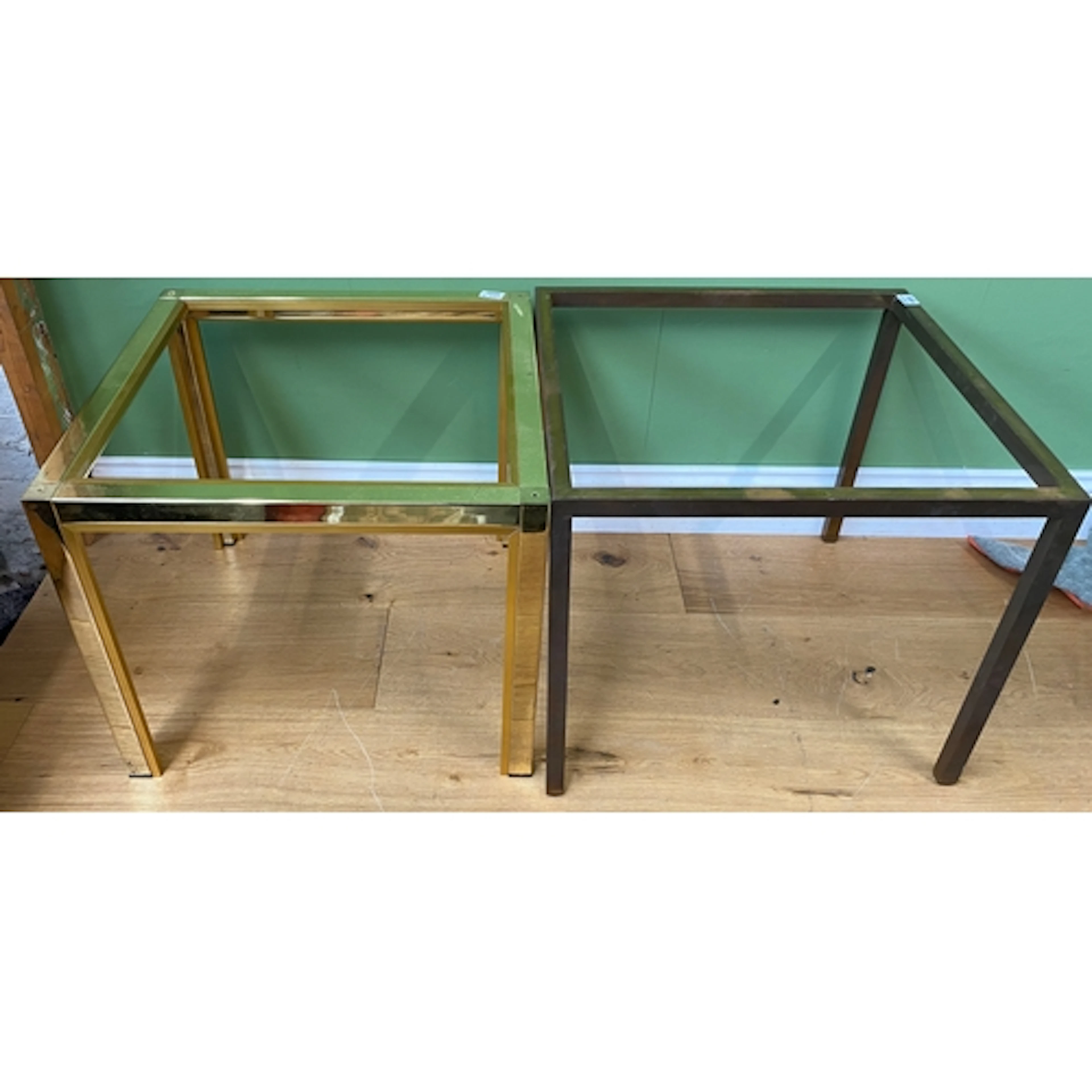 Two gilt metal square table bases, each 60cm square and 50cm...