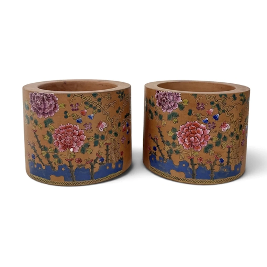 A PAIR OF ENAMELLED YIXING CLAY BRUSH POTS Decorated with fl...