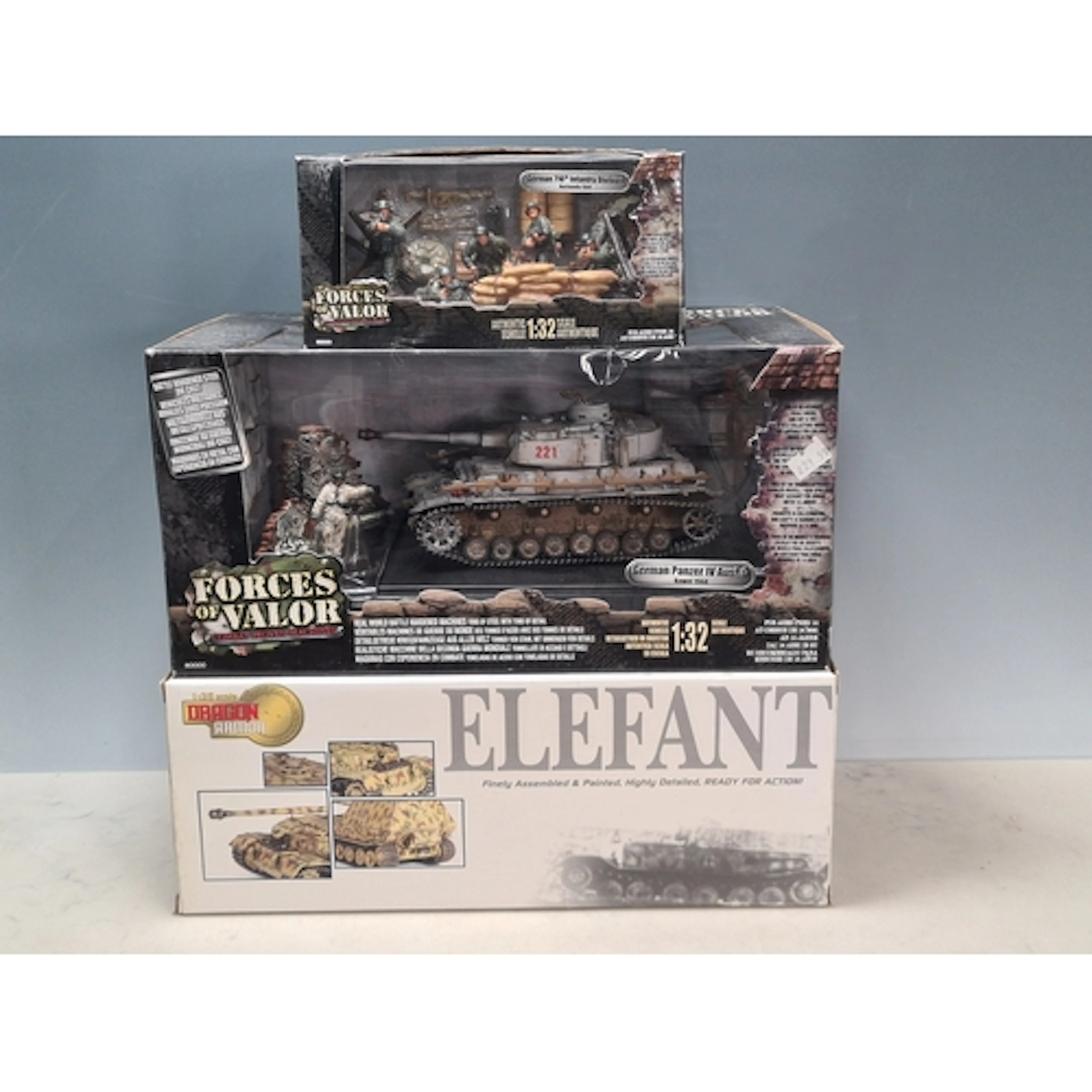 A boxed Forces of Valor 1:32 scale German Panzer IV and Germ...