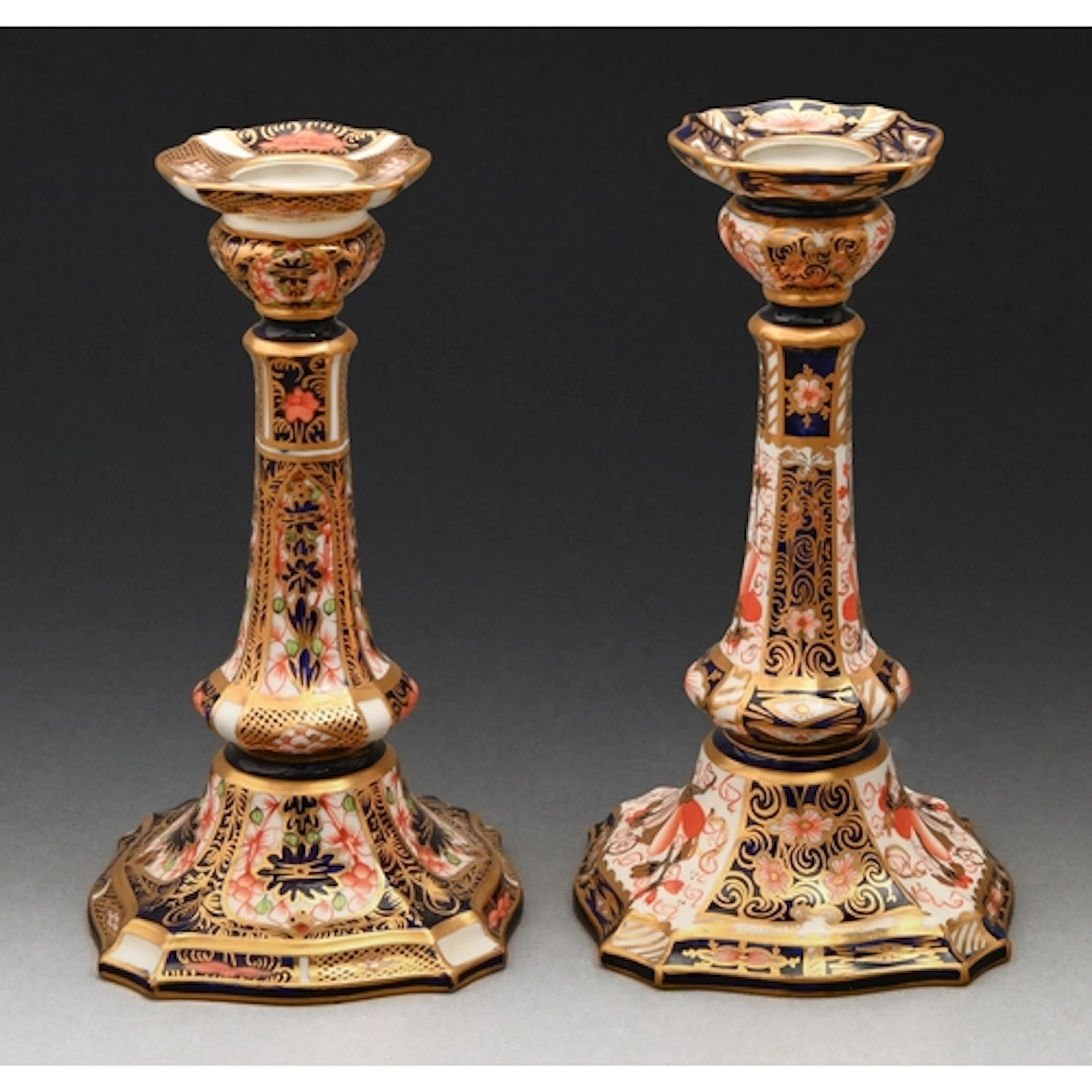 Two Royal Crown Derby Imari pattern candlesticks, 1917 and 1...