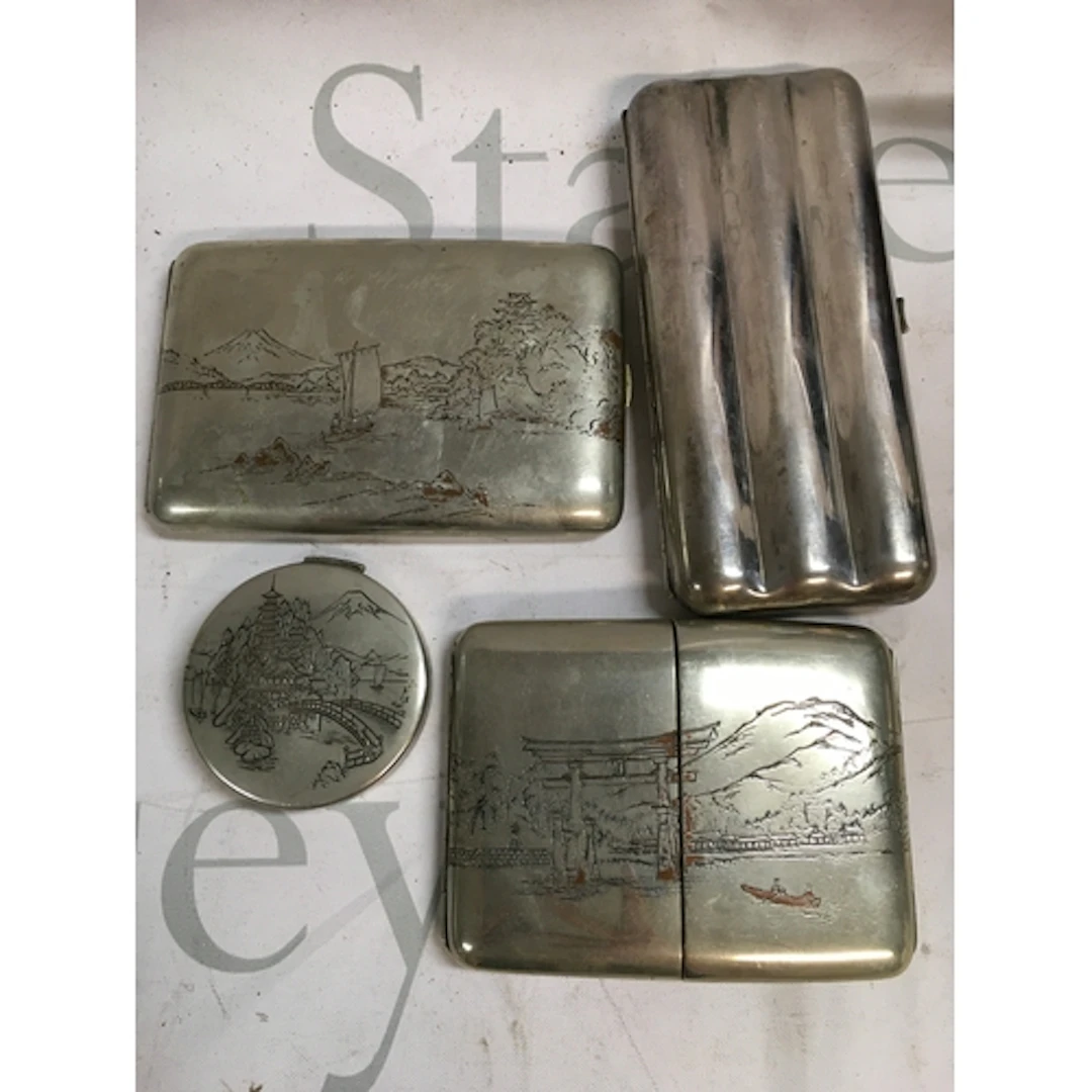 A collection of silver plated items including a cigar case a...