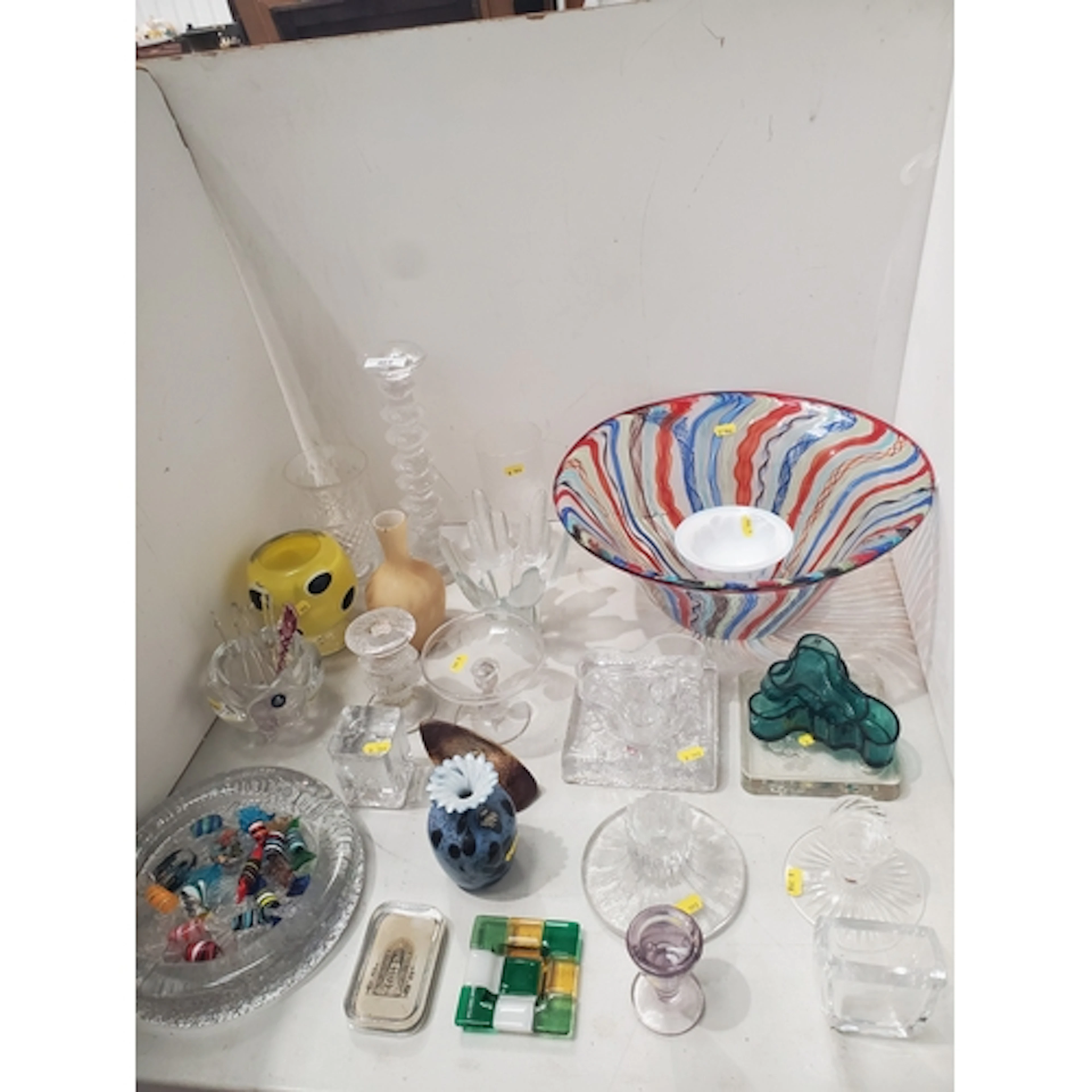 A collection of coloured glass including large studio glass ...