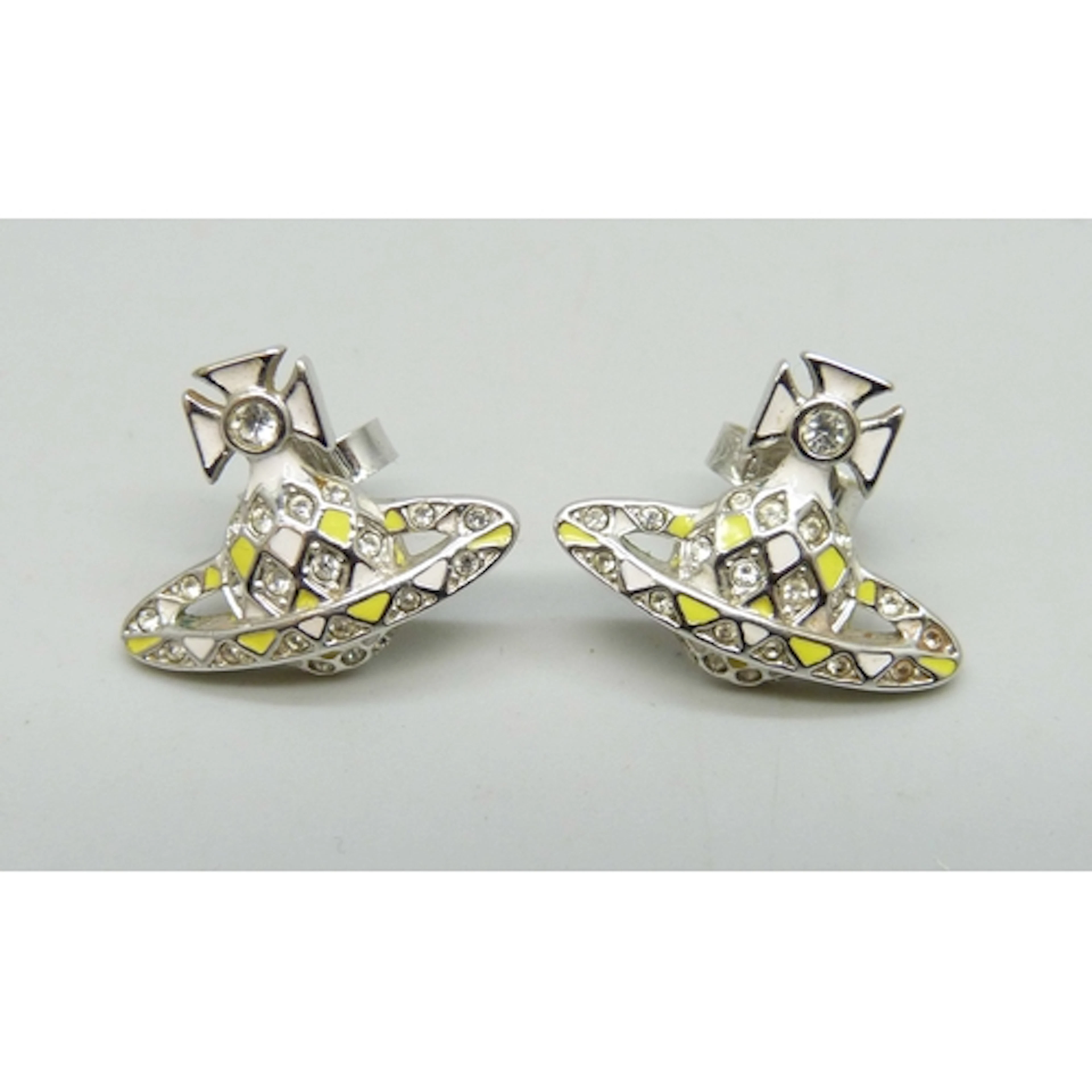 A pair of Vivienne Westwood orb earrings with yellow and whi...