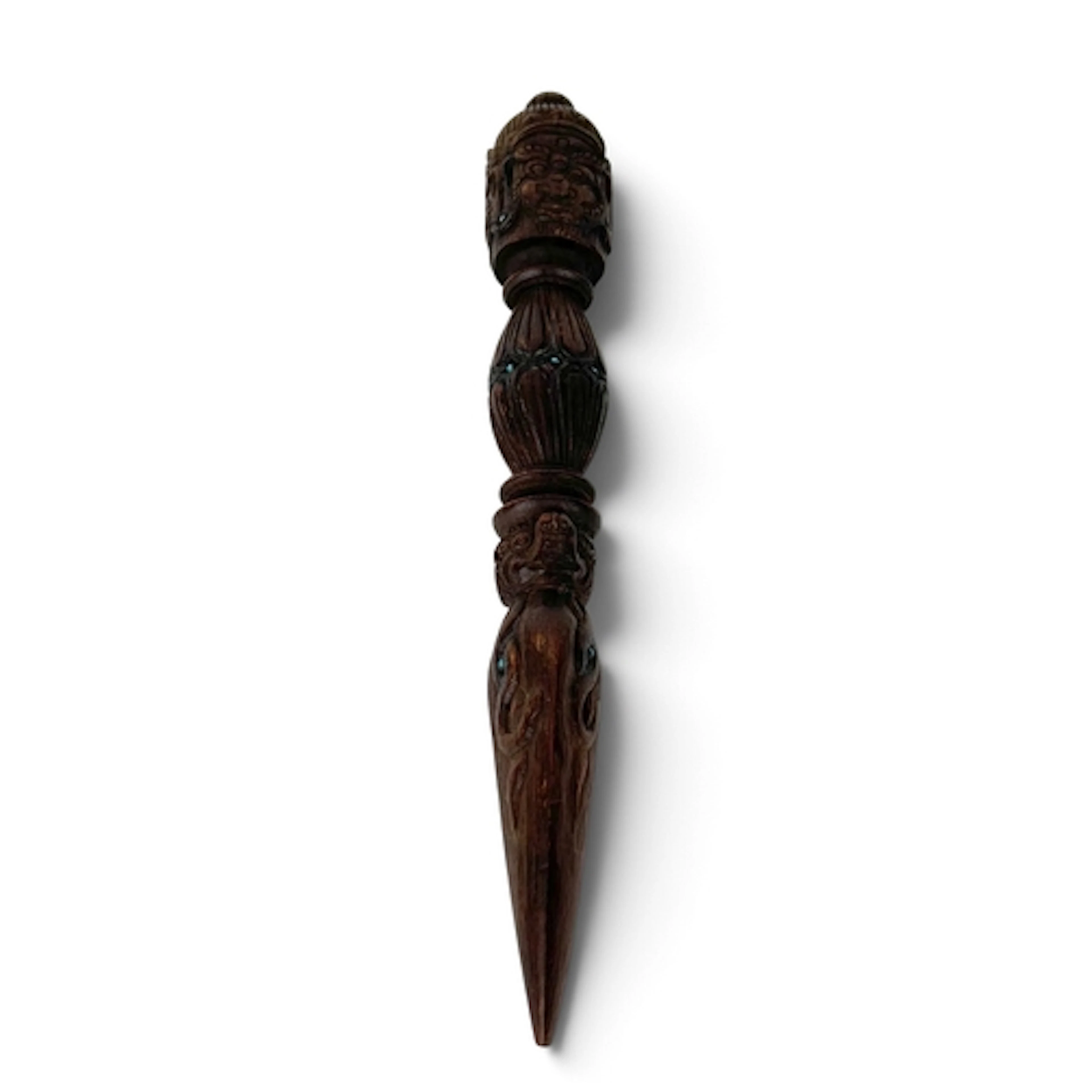 AN EARLY 20TH CENTURY TIBETAN CARVED WOODEN PURBA Inset with...