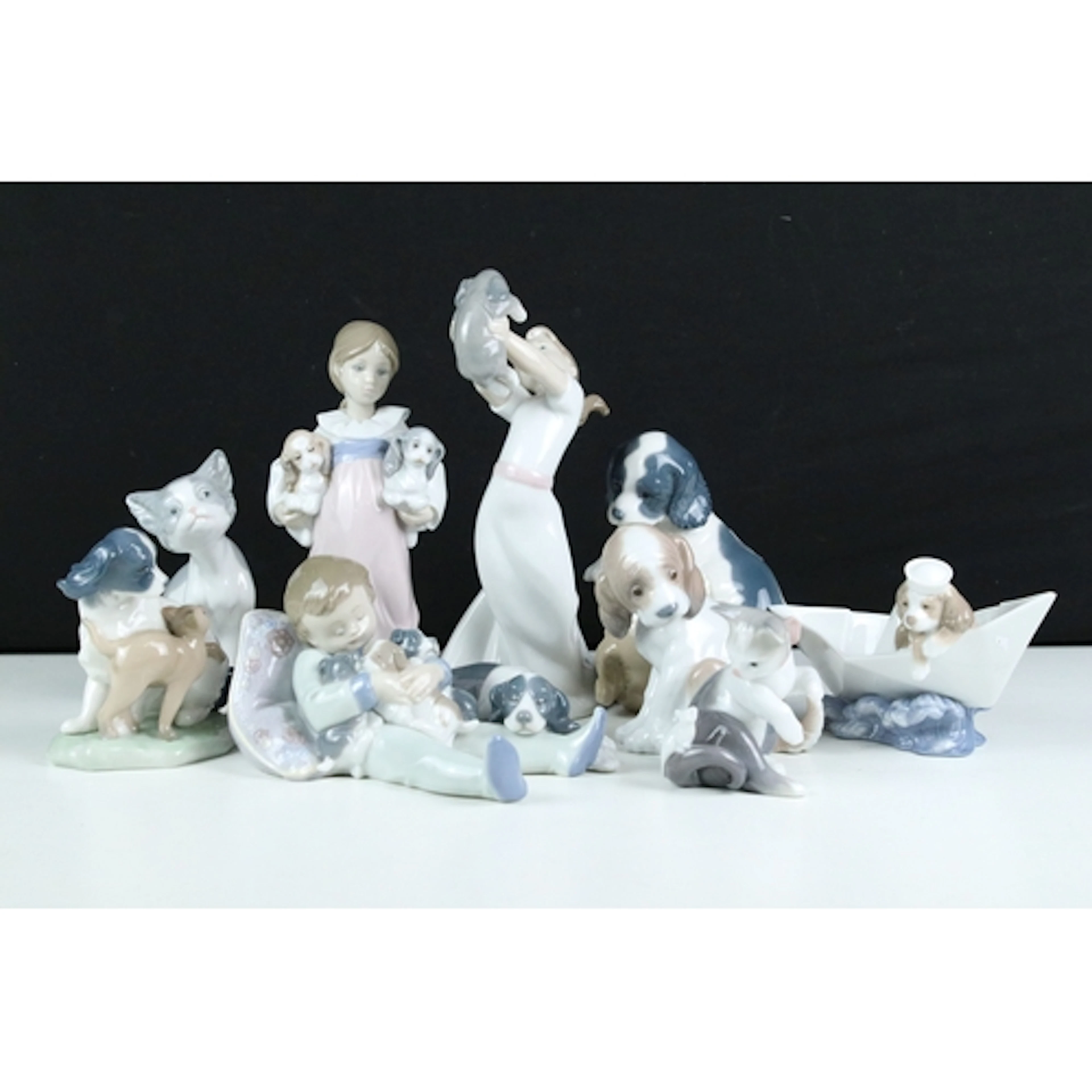 Seven Lladro figurines to include #1535 'Sweet Dreams', #803...