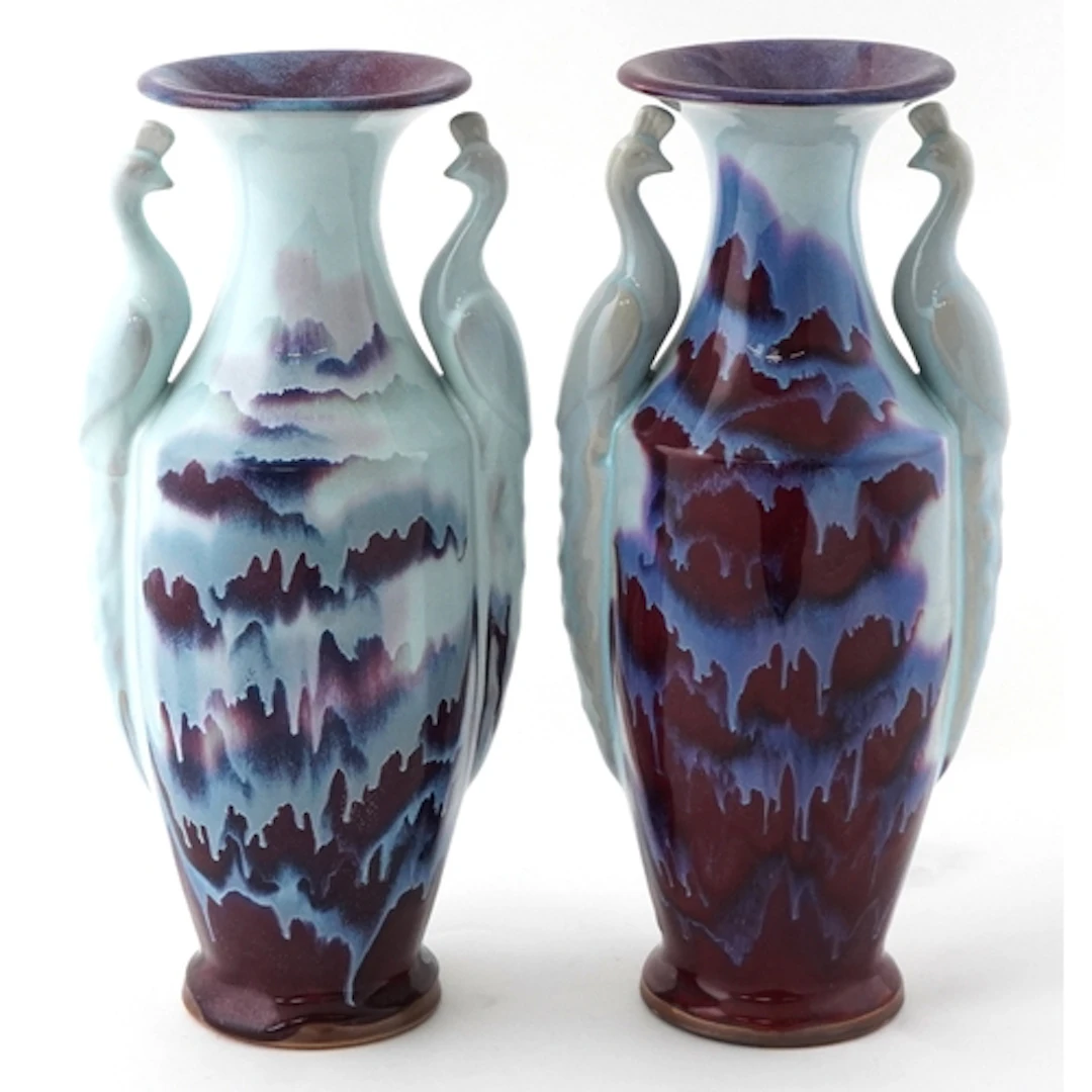Pair of Chinese Qianjiang style porcelain vases with peacock...