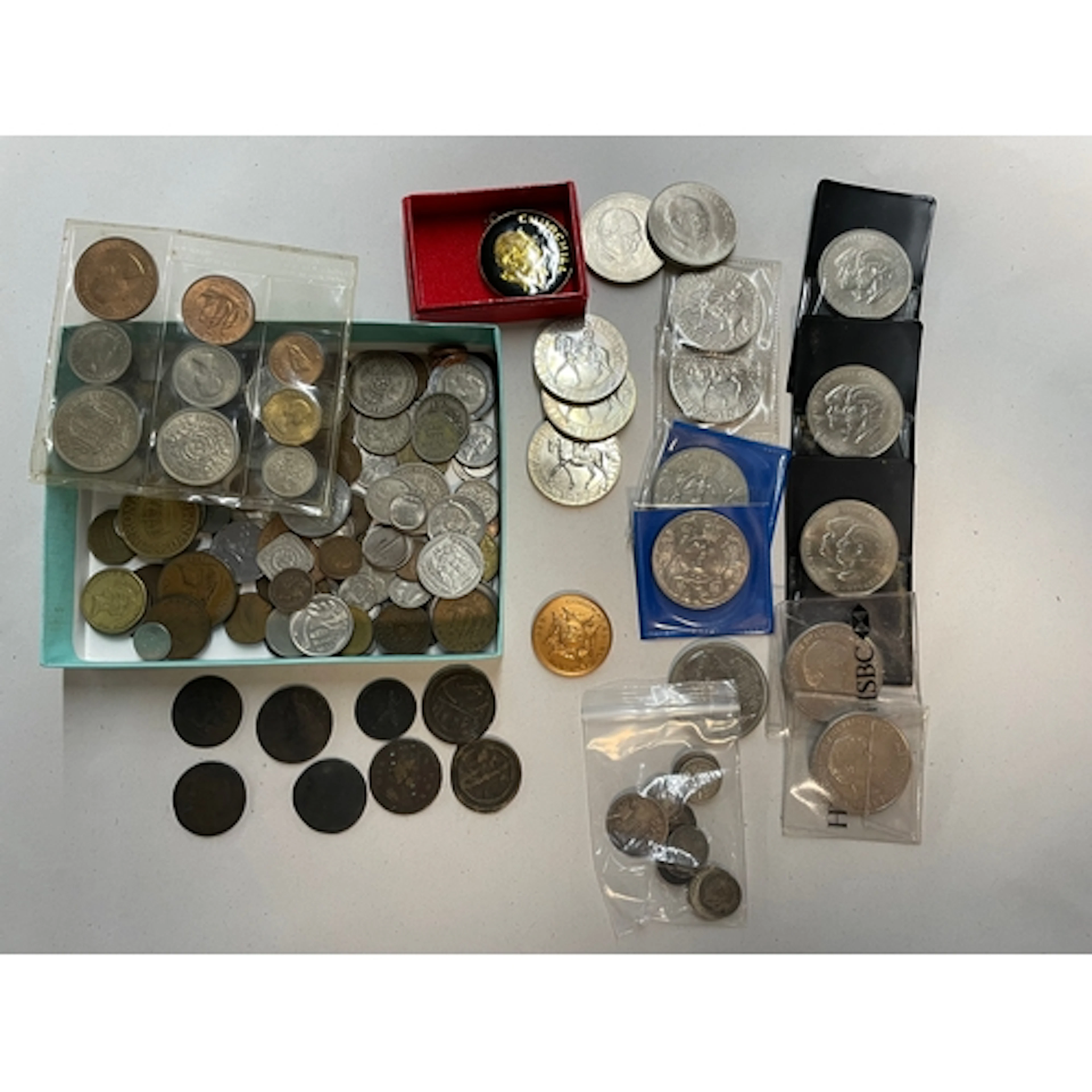 Assorted coins, including 25.9 grams of mostly 500-grade sil...