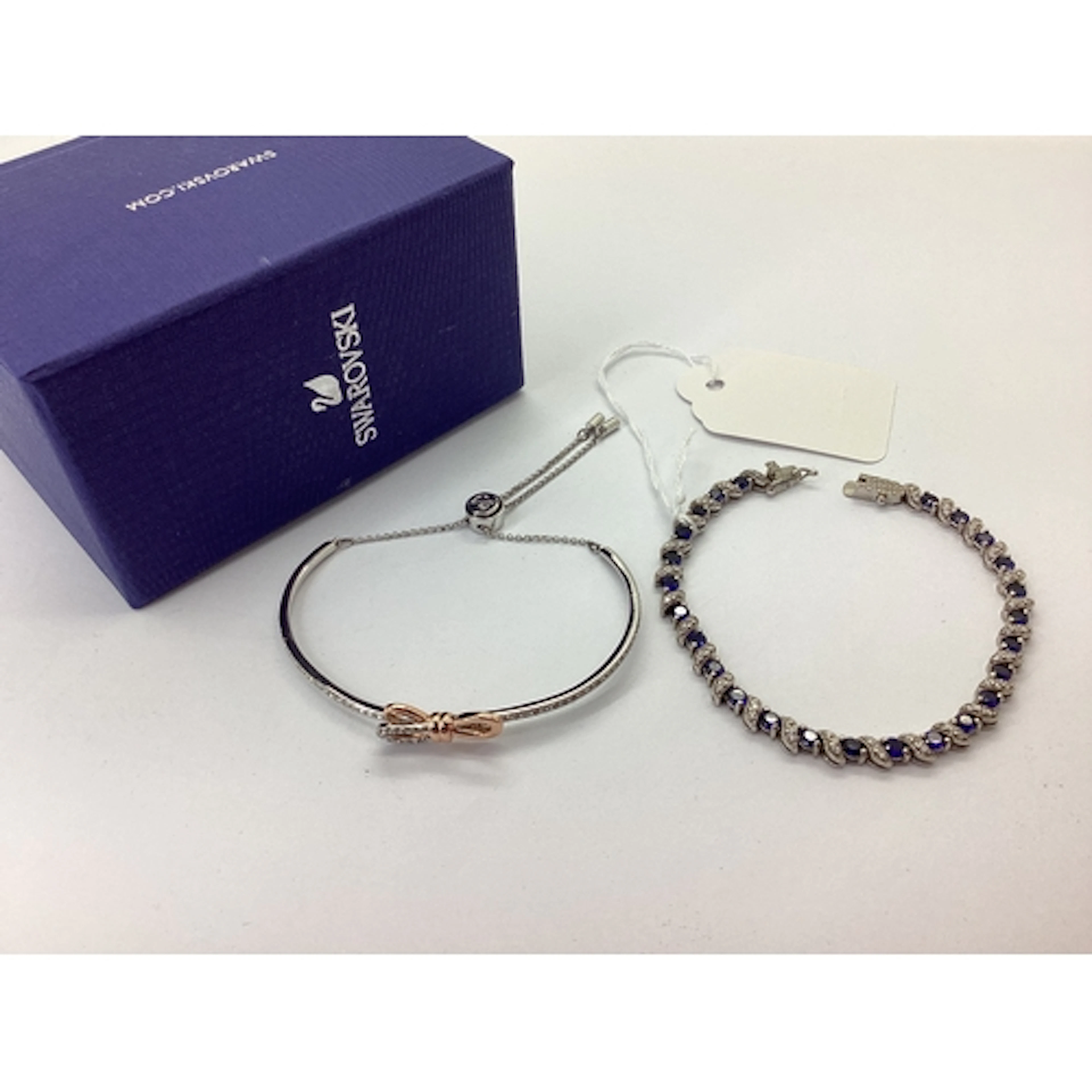 A Decorative Modern Line Bracelet, alternately set, to snap ...