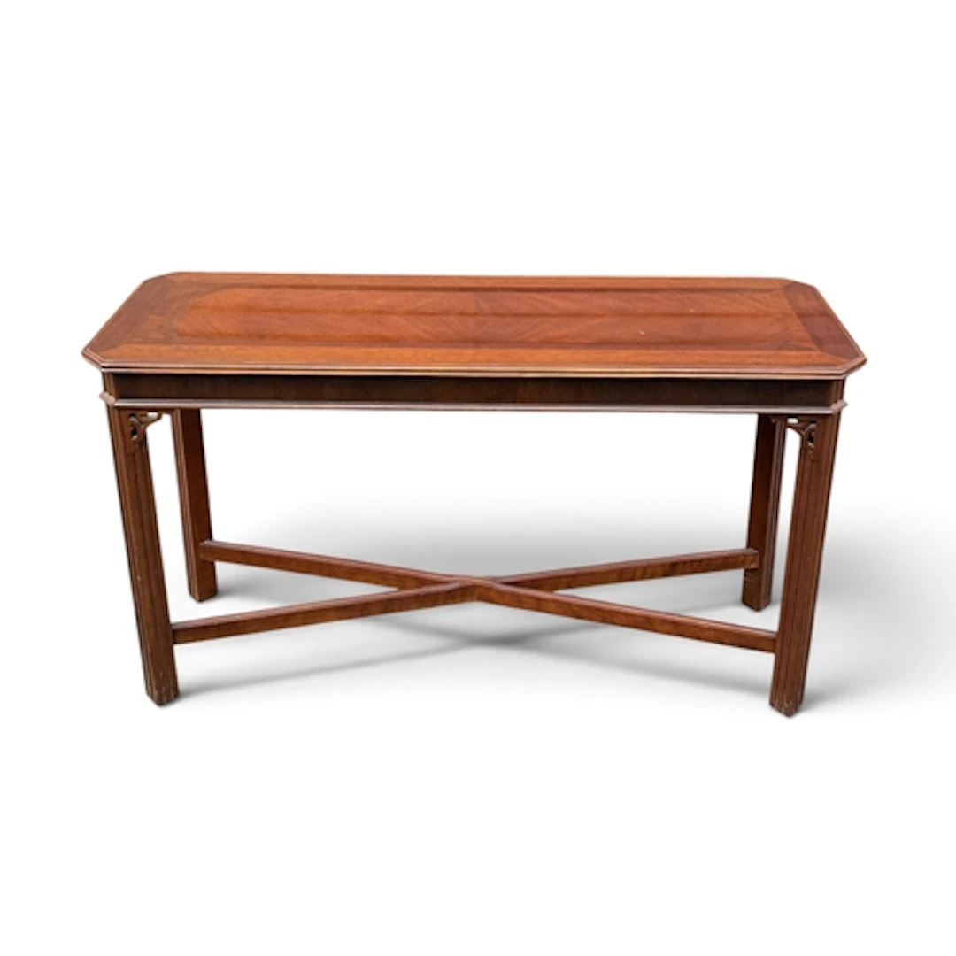 A REPRODUCTION MAHOGANY CONSOLE TABLE With fretwork decorati...