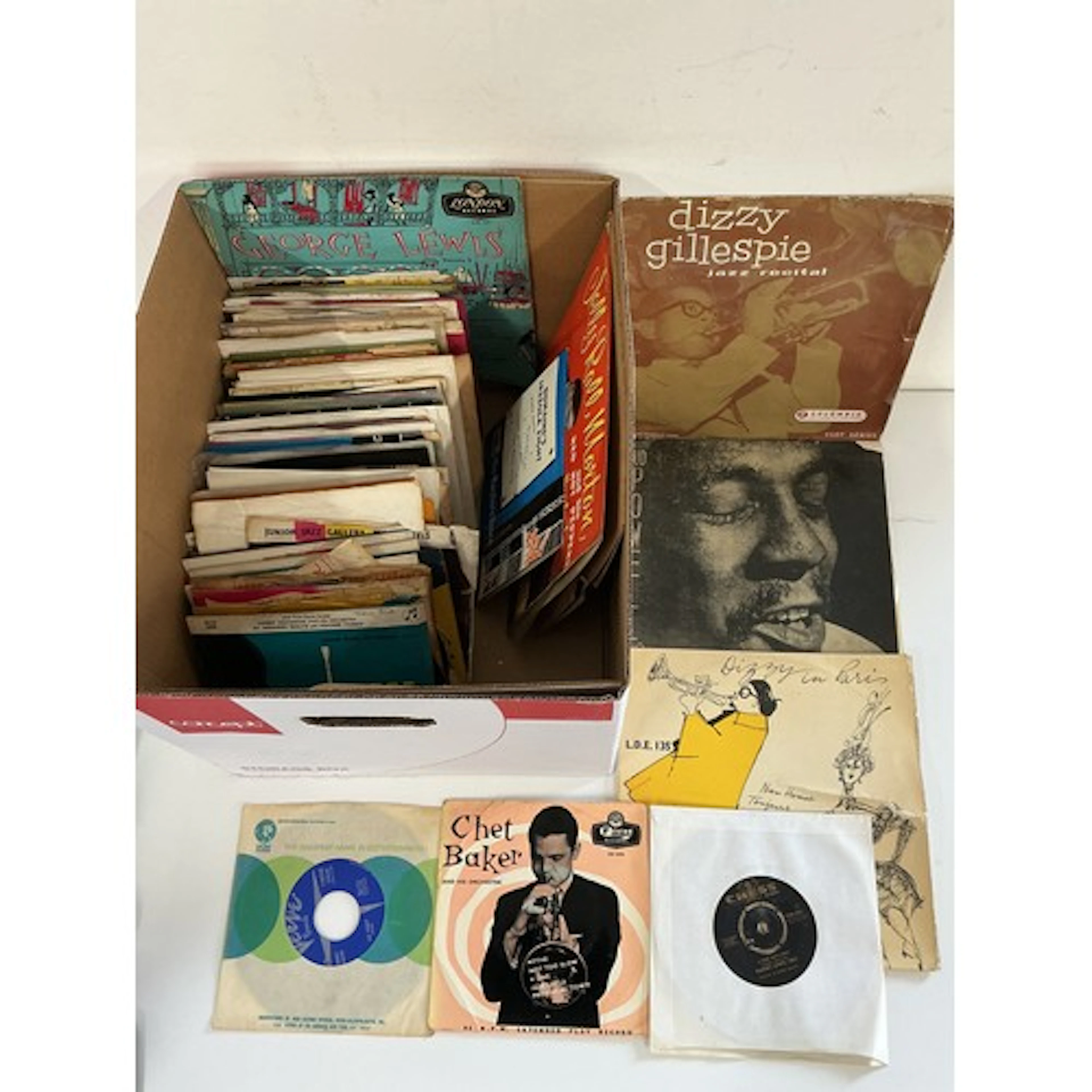 A box of jazz 7” singles, EPs and 10” records. Various artis...