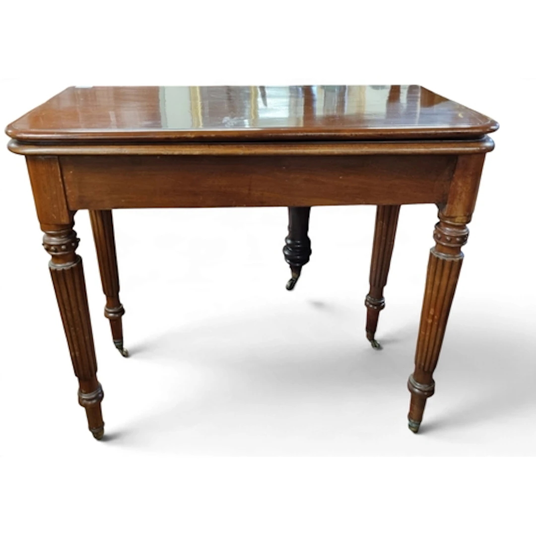 A 19th Century Mahogany fold over Tea Table in the manner of...