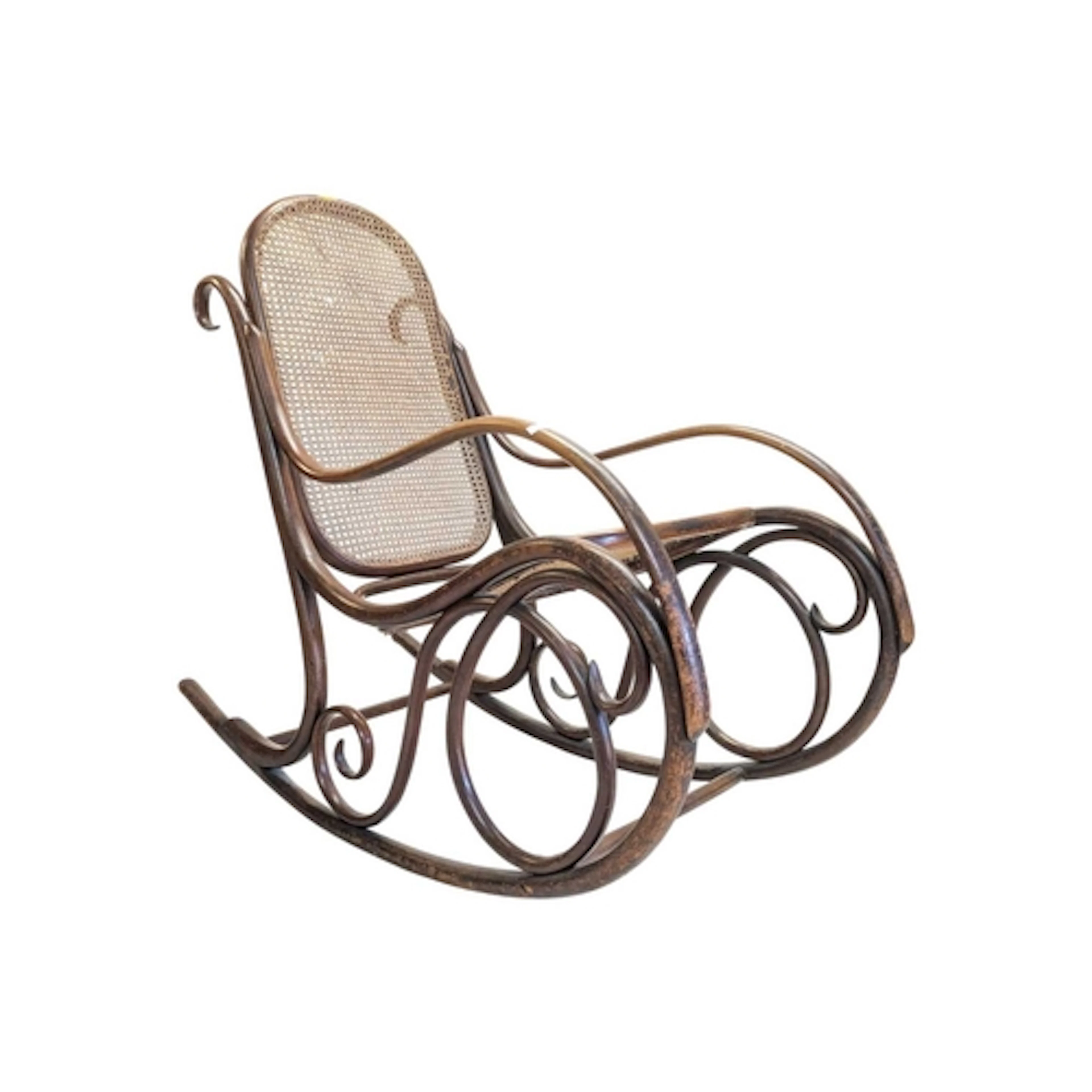 A 19th century Victorian Thonet bentwood and cane rocking ch...