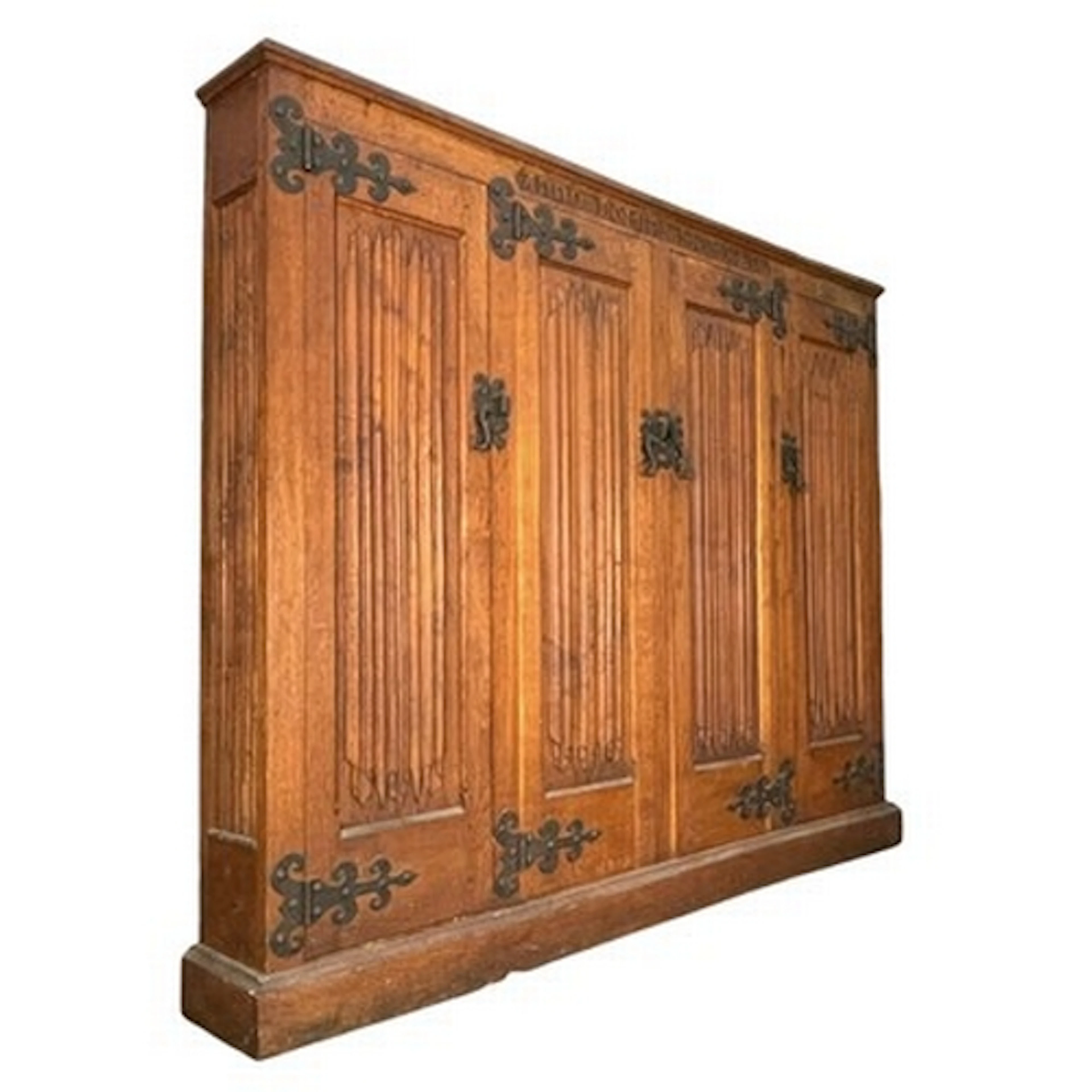 A Neo-Gothic inspired 20th century carved oak and iron-bound...