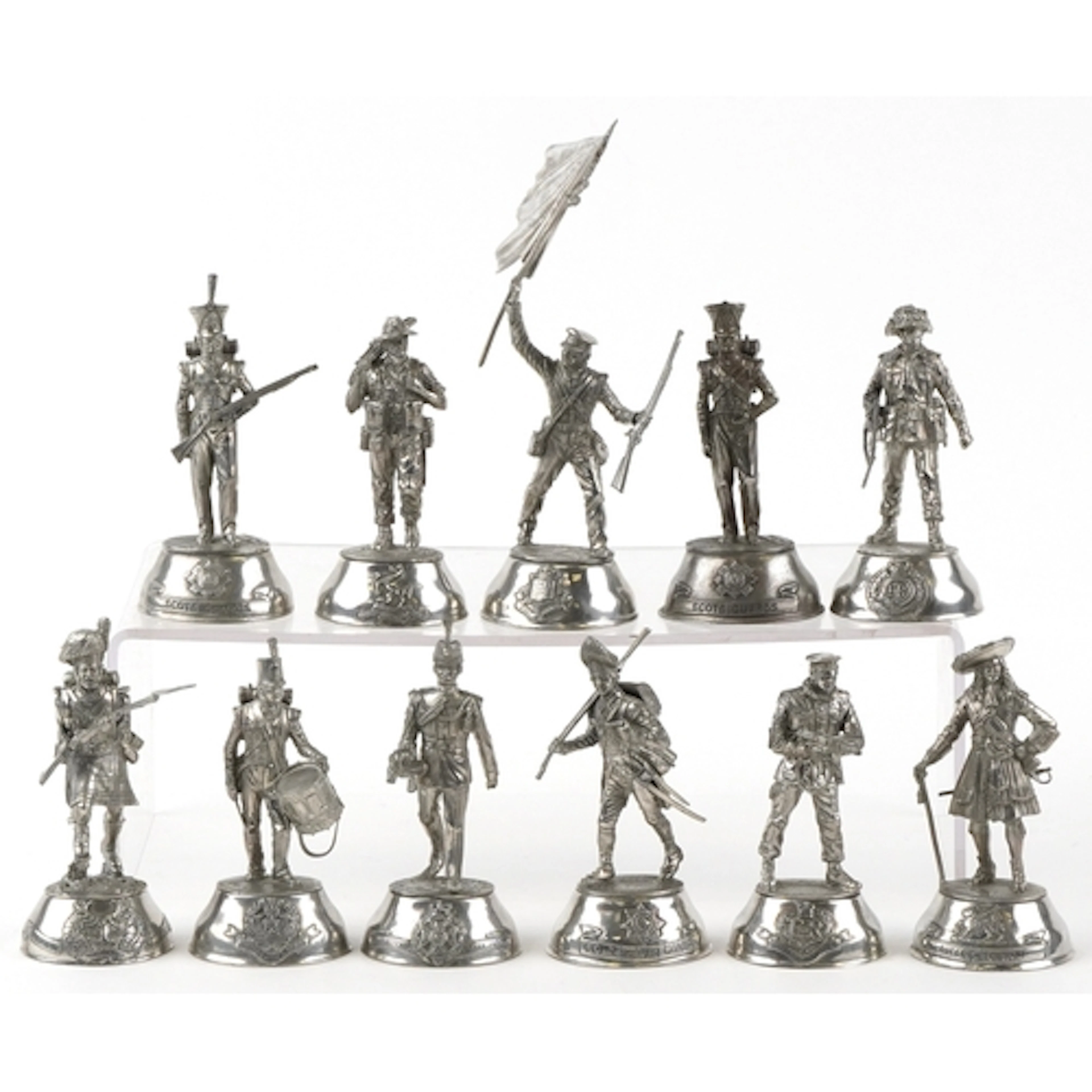 Eleven Buckingham pewter military figures designed by Charle...