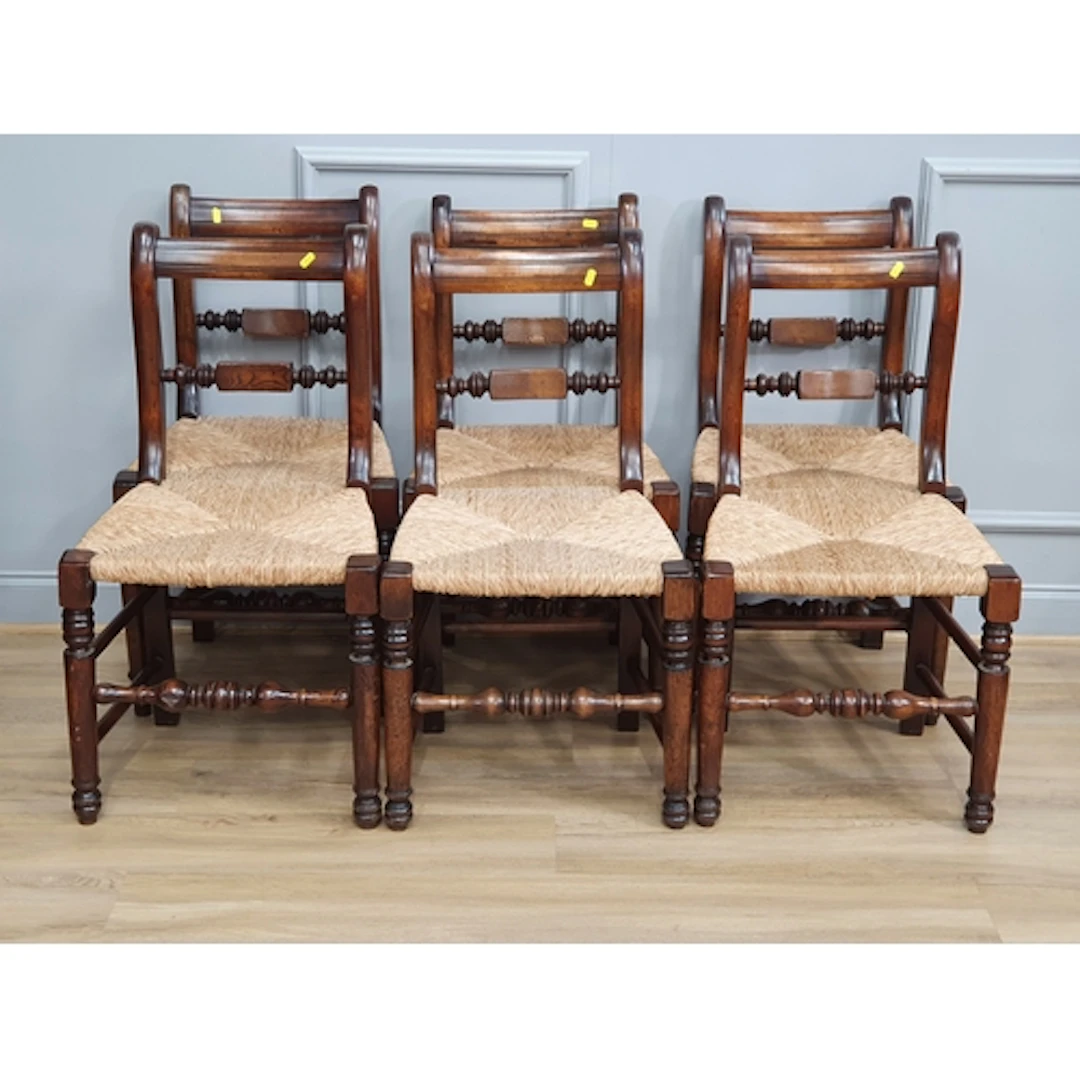 A set of six oak rush seated Dining Chairs, (R3).
