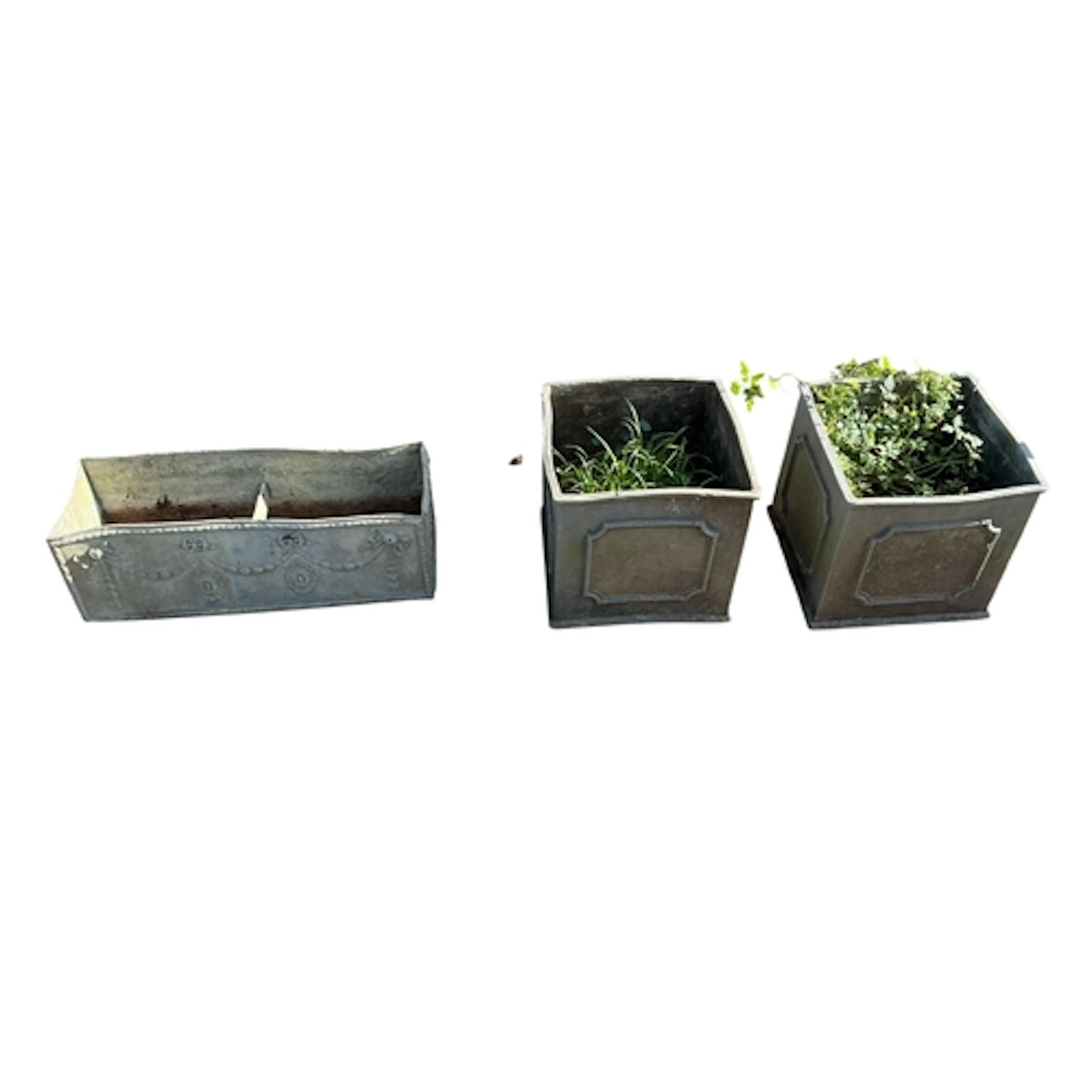 Four lead planters, largest width 62cm, depth 34cm, height 3...