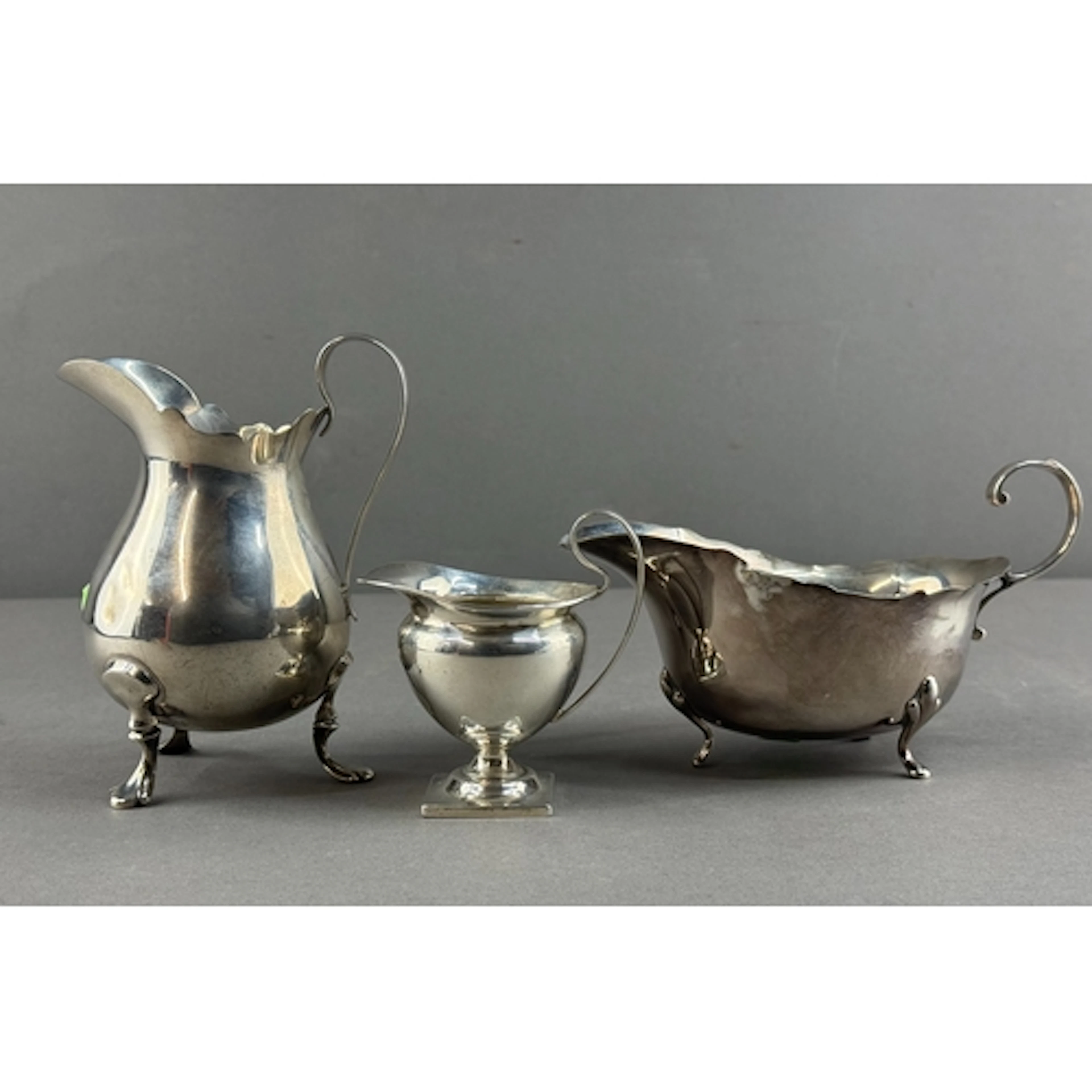Silver: a sauce boat by William Suckling, Birmingham 1936; a...