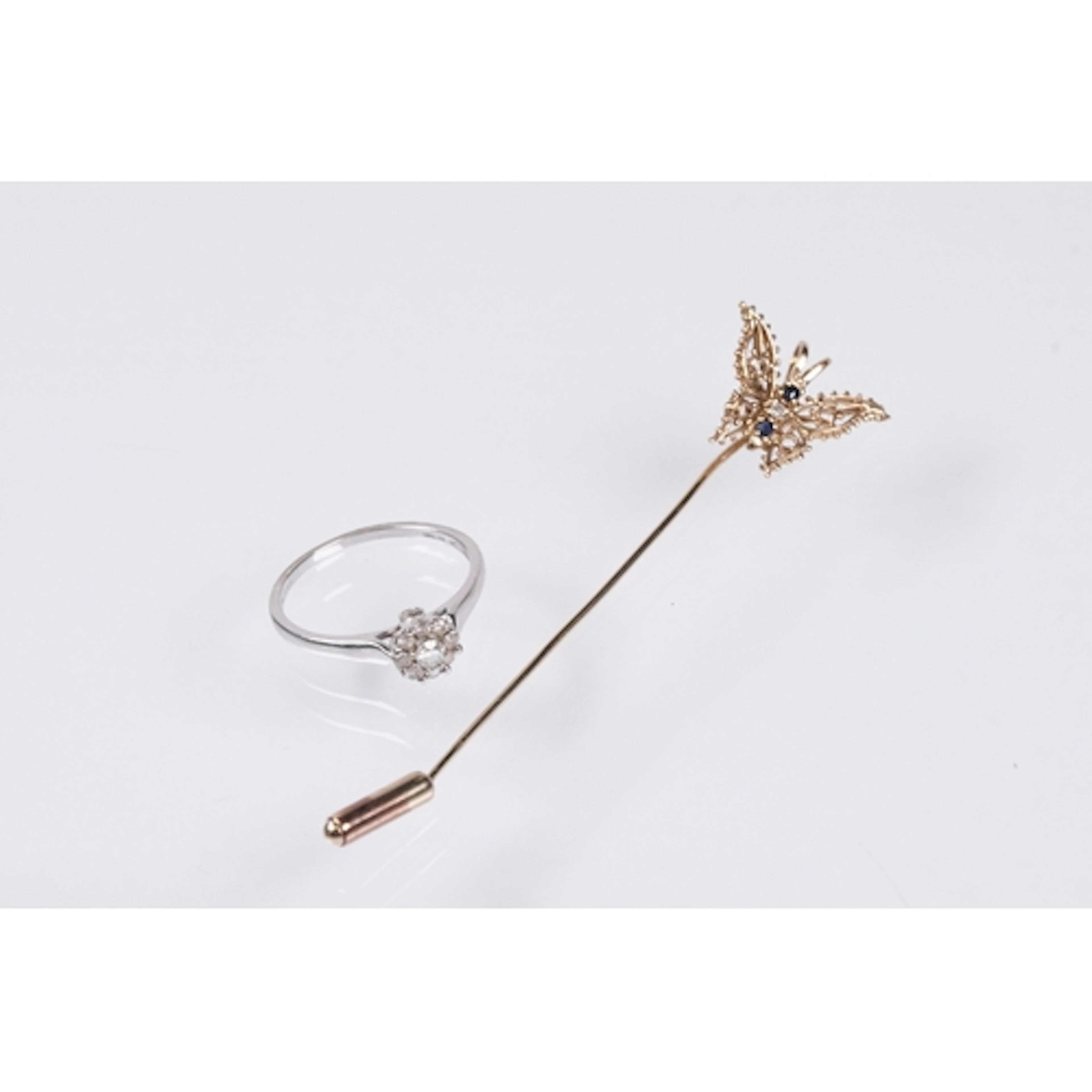 9ct white gold and diamond cluster ring. The ring being set ...
