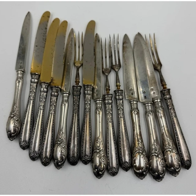 A selection of fourteen Continental silver handled dessert k...