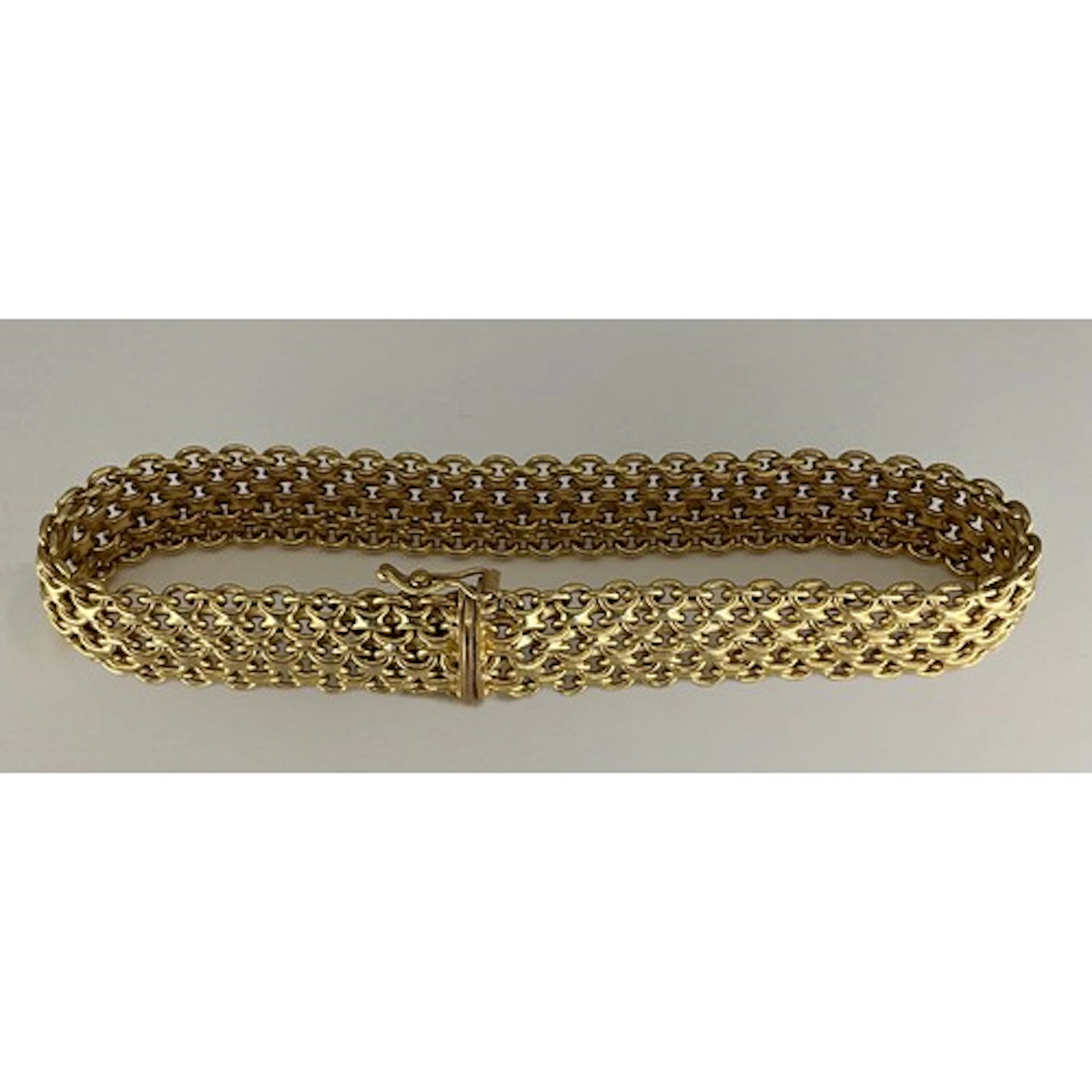 A 9ct gold chain mesh bracelet, Sheffield import marks, 11.8...