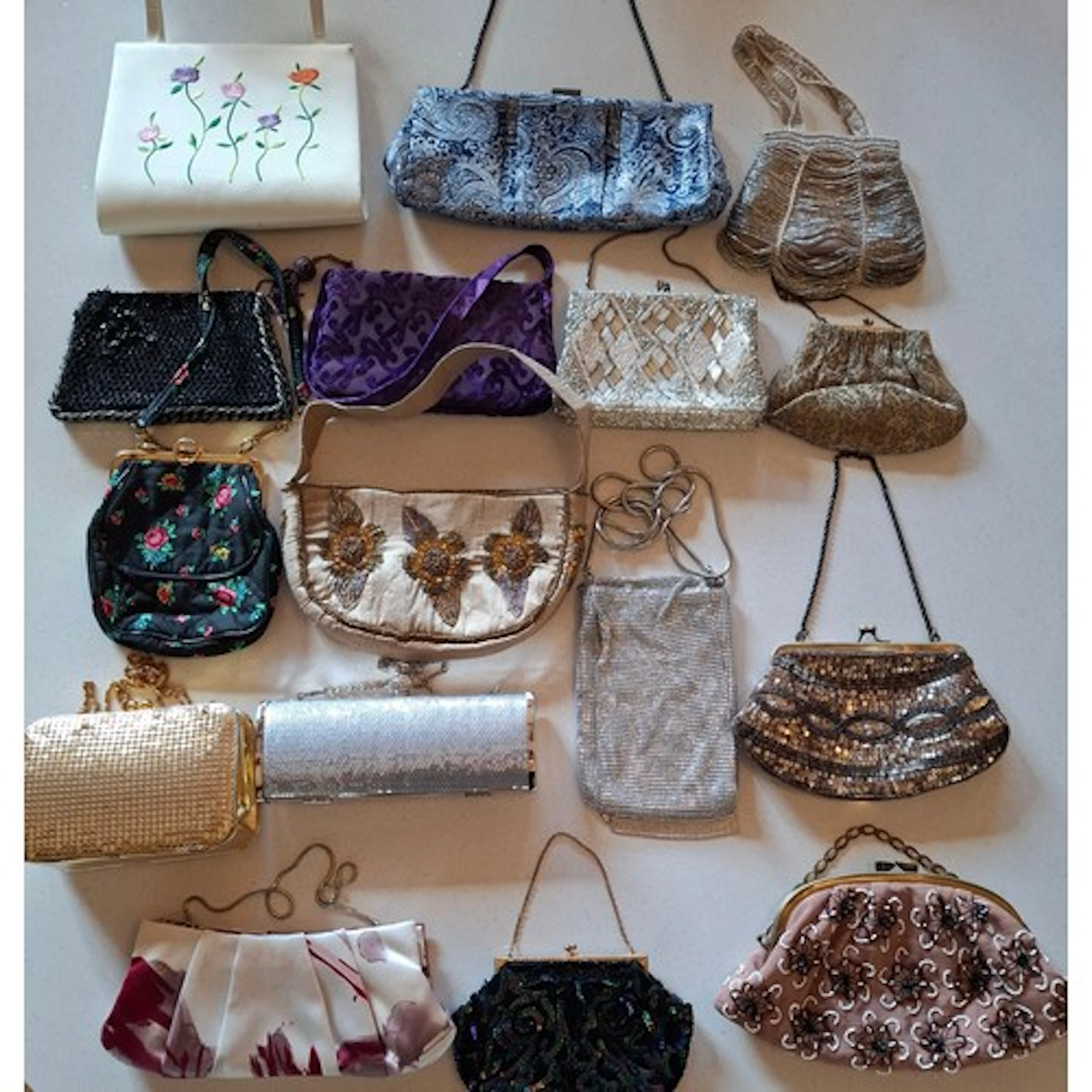 A collection of vintage and modern evening and clutch bags. ...