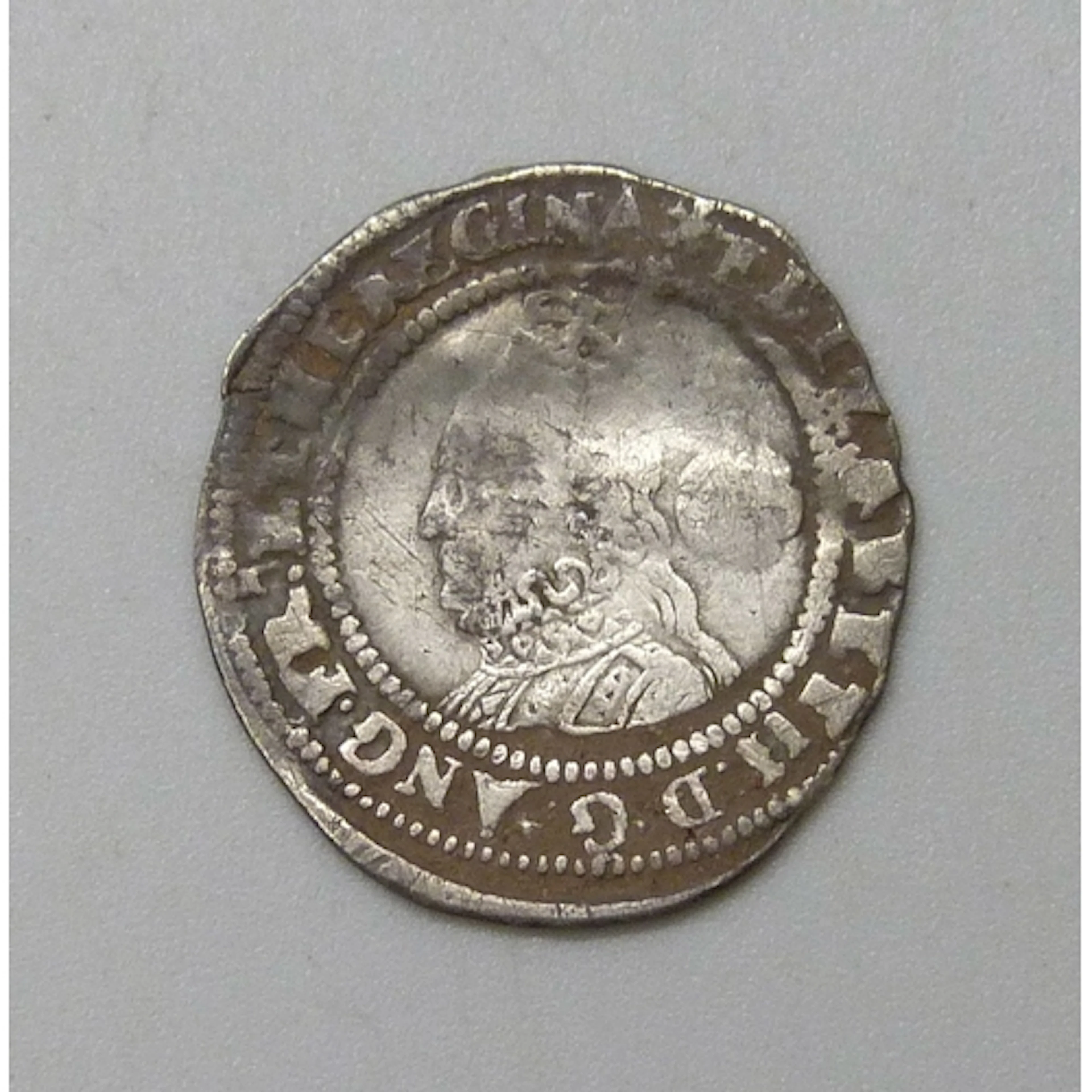 Coins - an Elizabeth I threepence M.M. Eglantine, dated 1574...