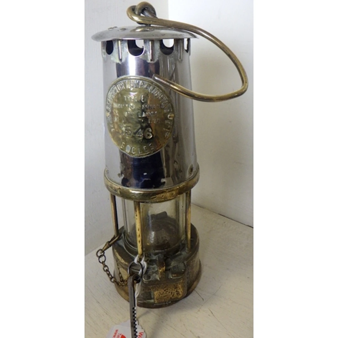 An Eccles miner's lamp with striking pin