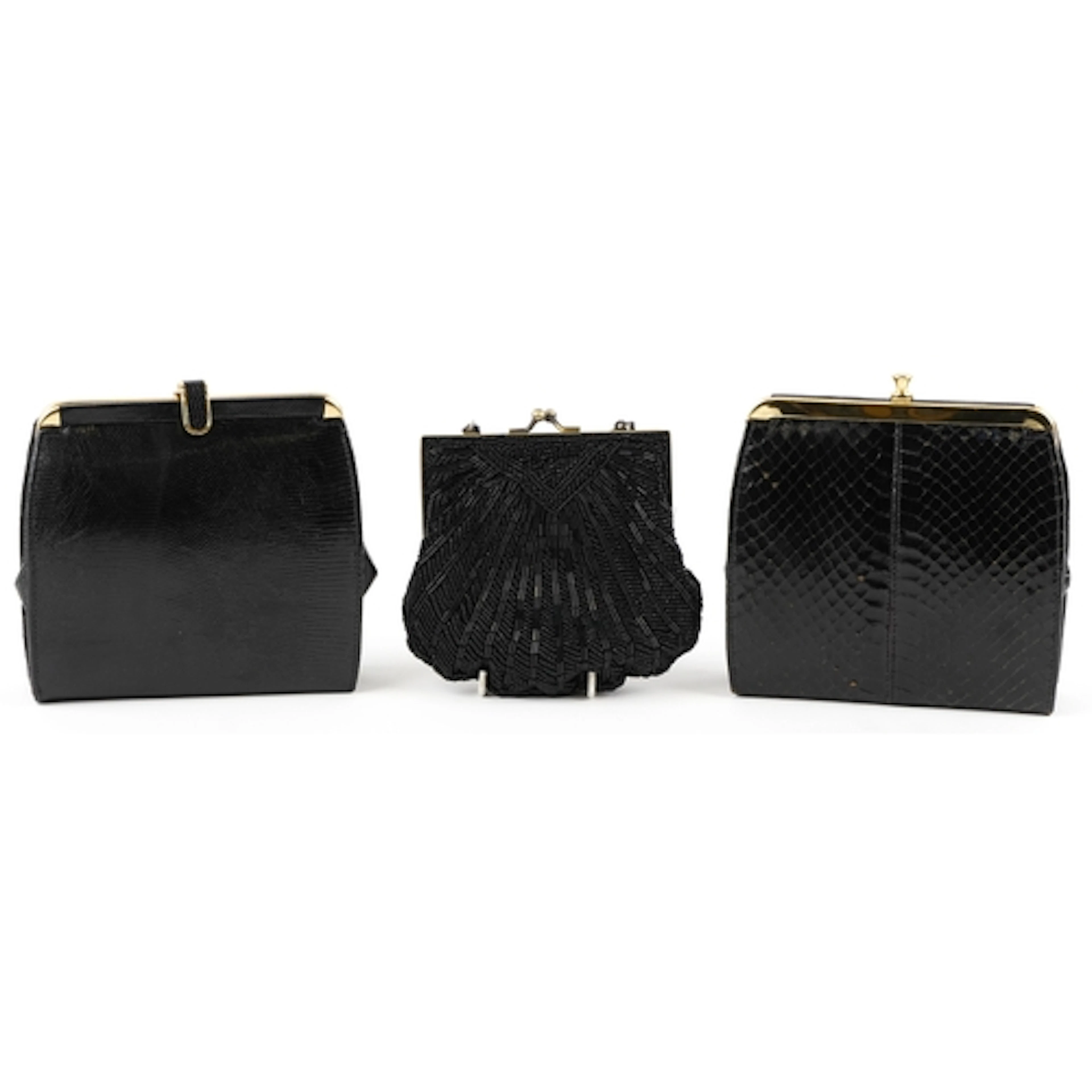 A group of vintage ladies handbags including a snakeskin, li...