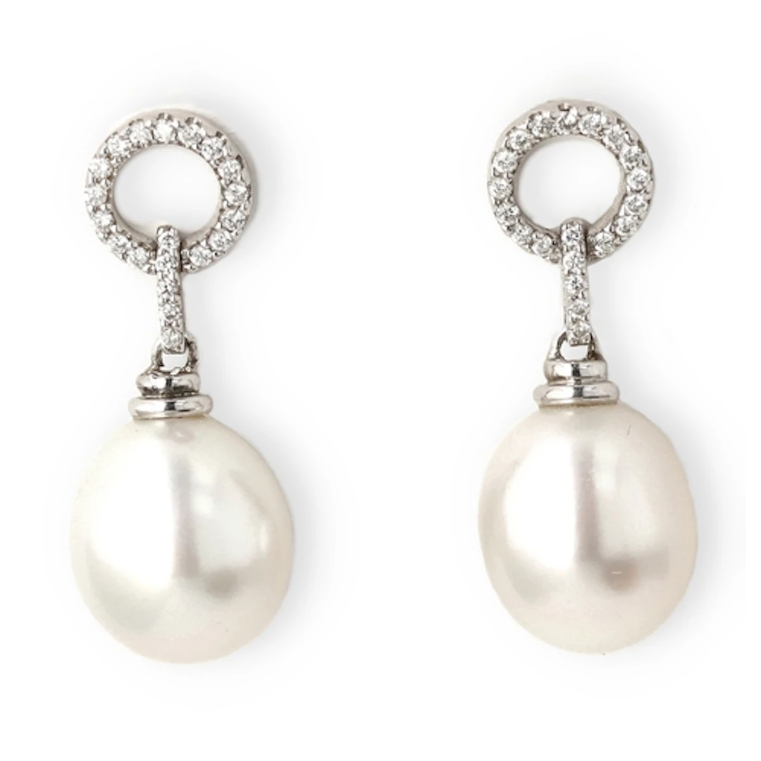 A PAIR OF 18 CARAT WHITE GOLD DIAMOND AND CULTURED PEARL EAR...