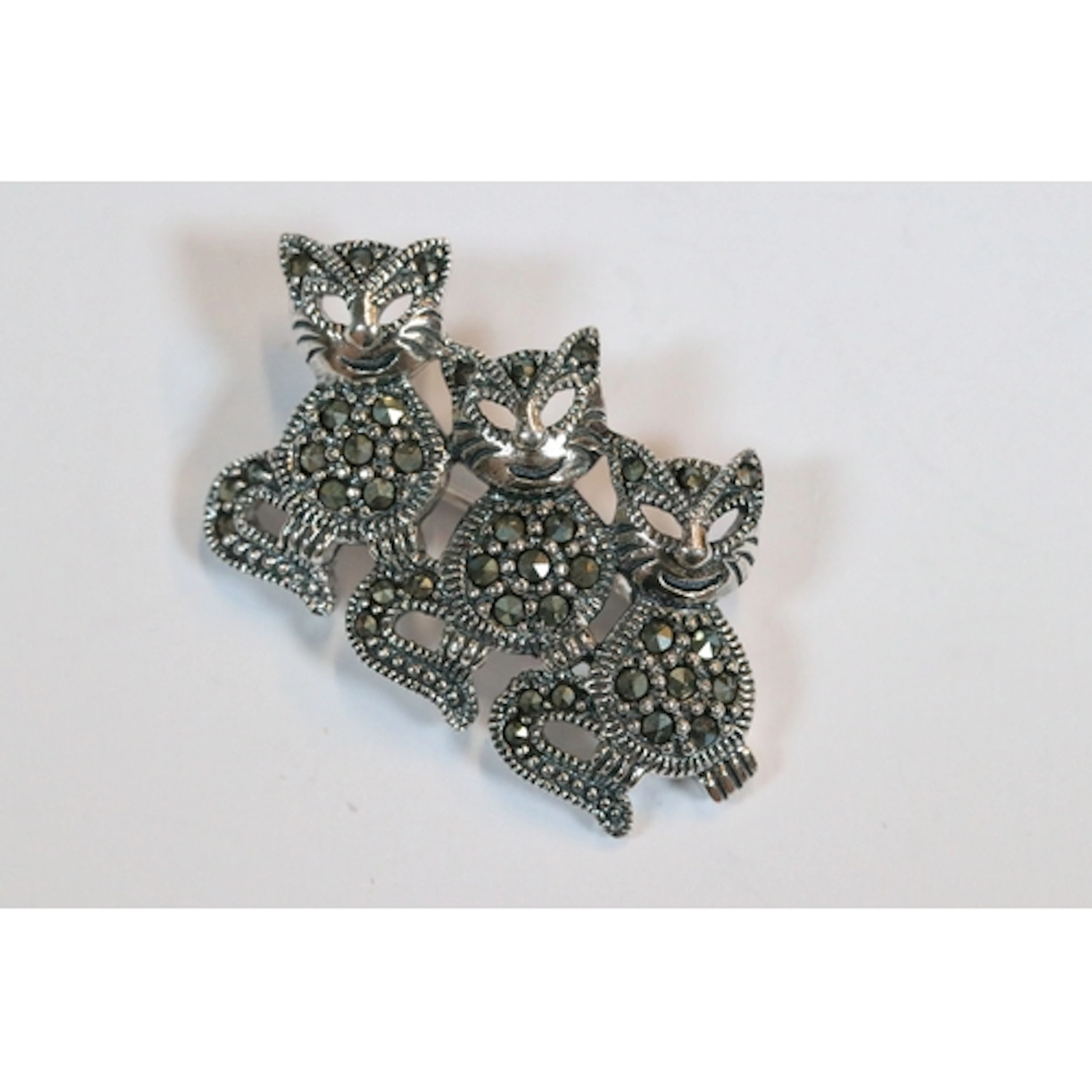 Silver and marcasite three cat brooch