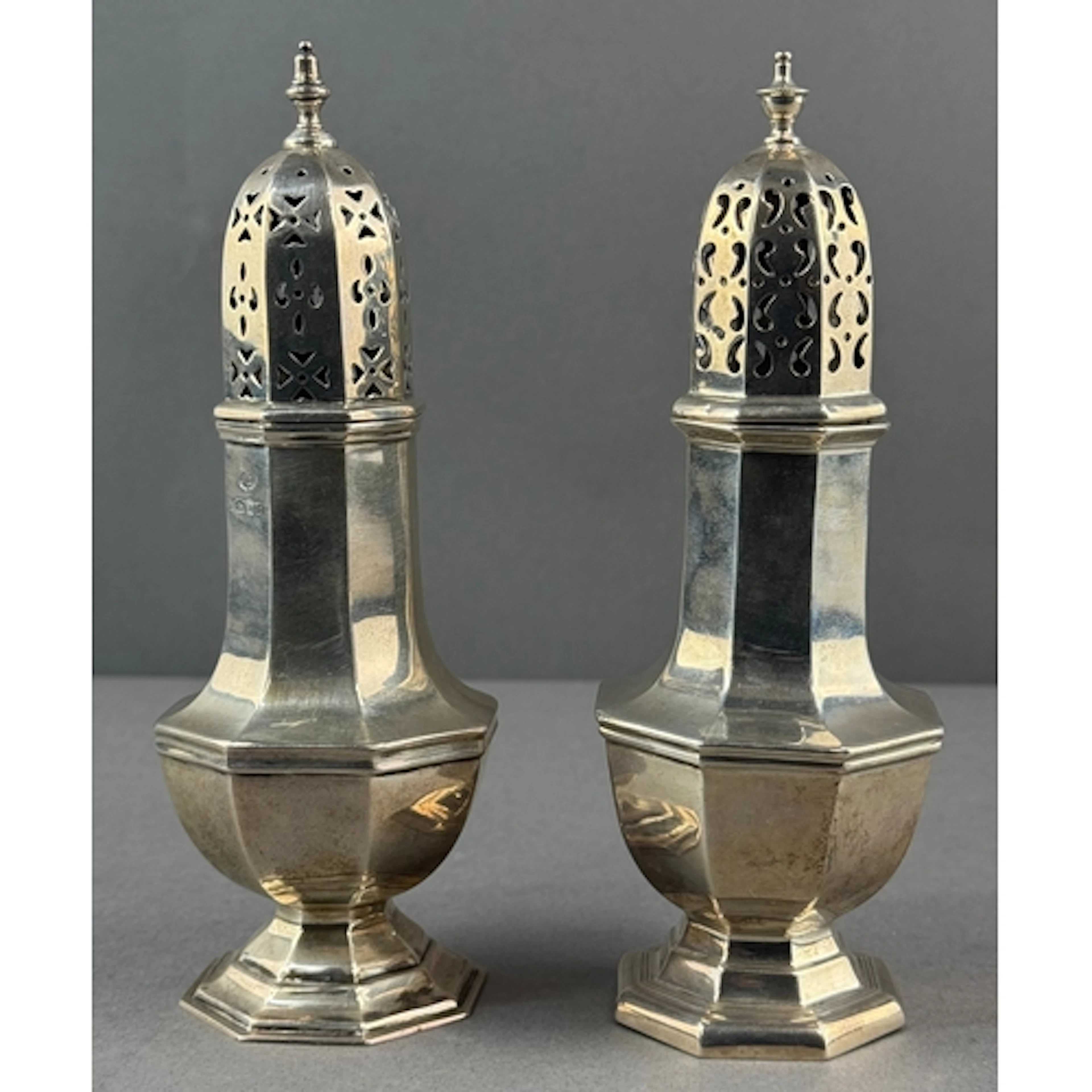 Silver: a sugar caster of octagonal baluster form by Wilson ...