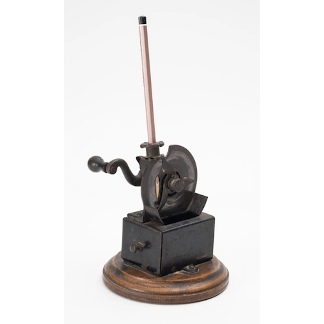 An early 20th Century mechanical pencil sharpener. Stamped A...