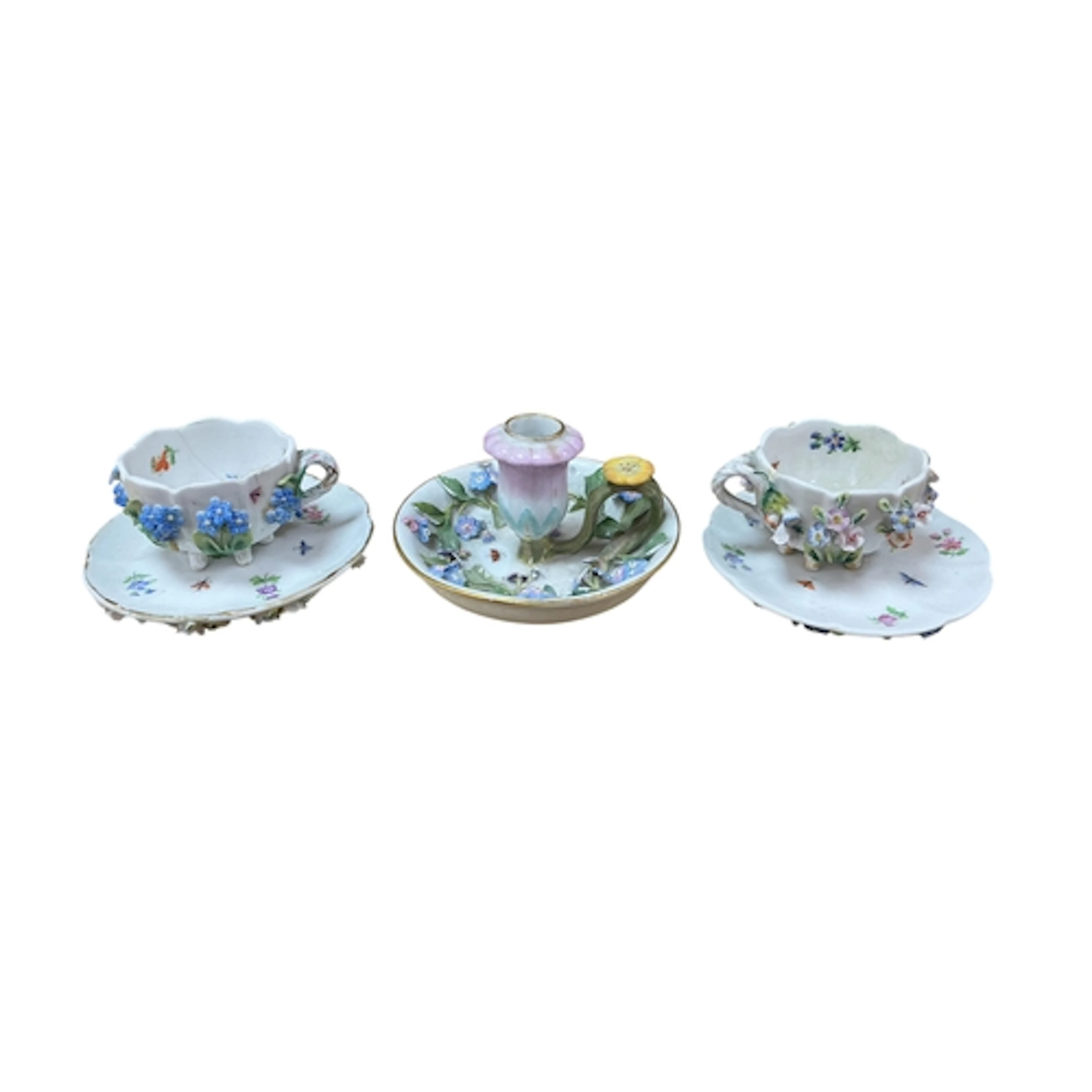 A 19th century Meissen porcelain chamberstick and 2 Sitzendo...
