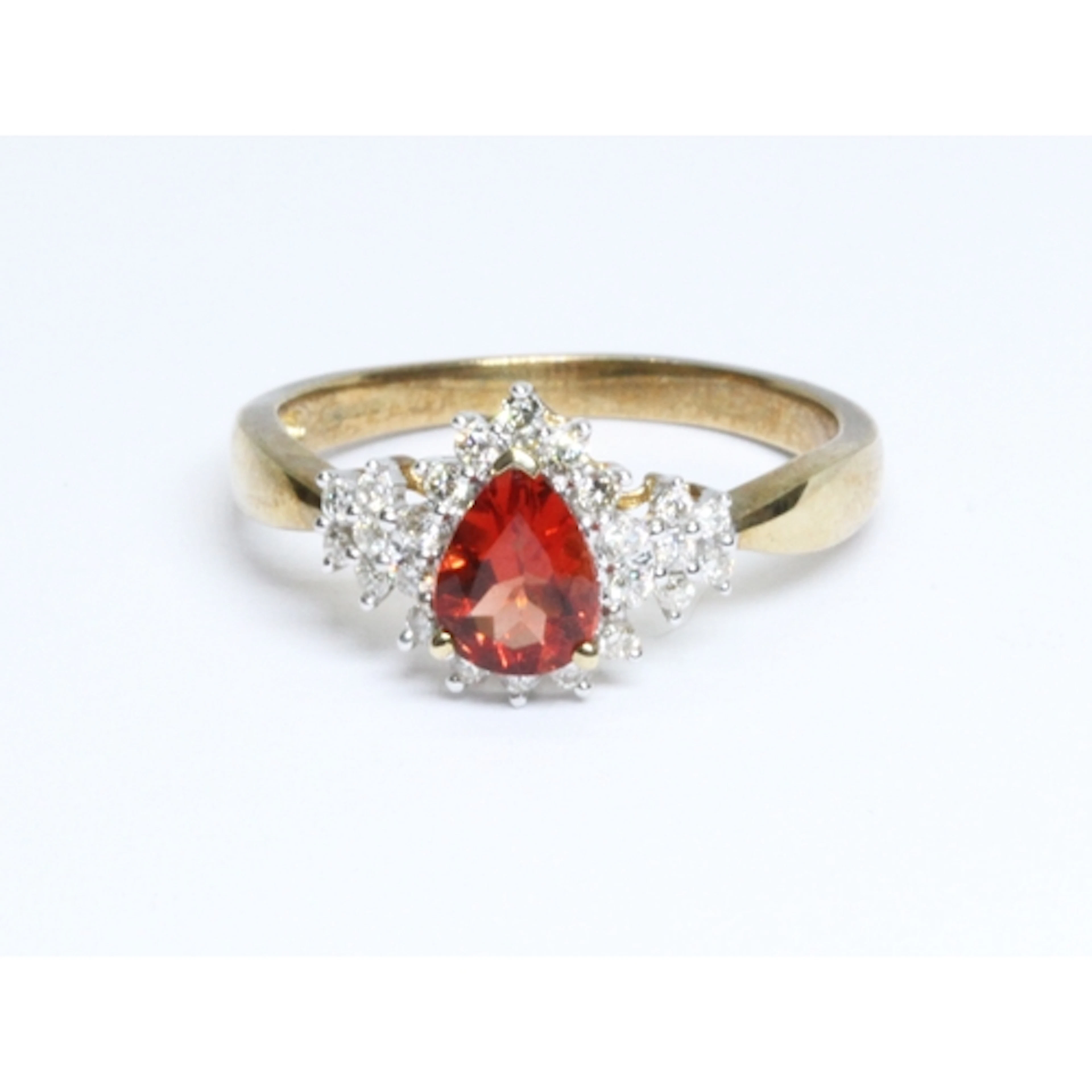 A red beryl and diamond ring, the cluster measuring approxim...