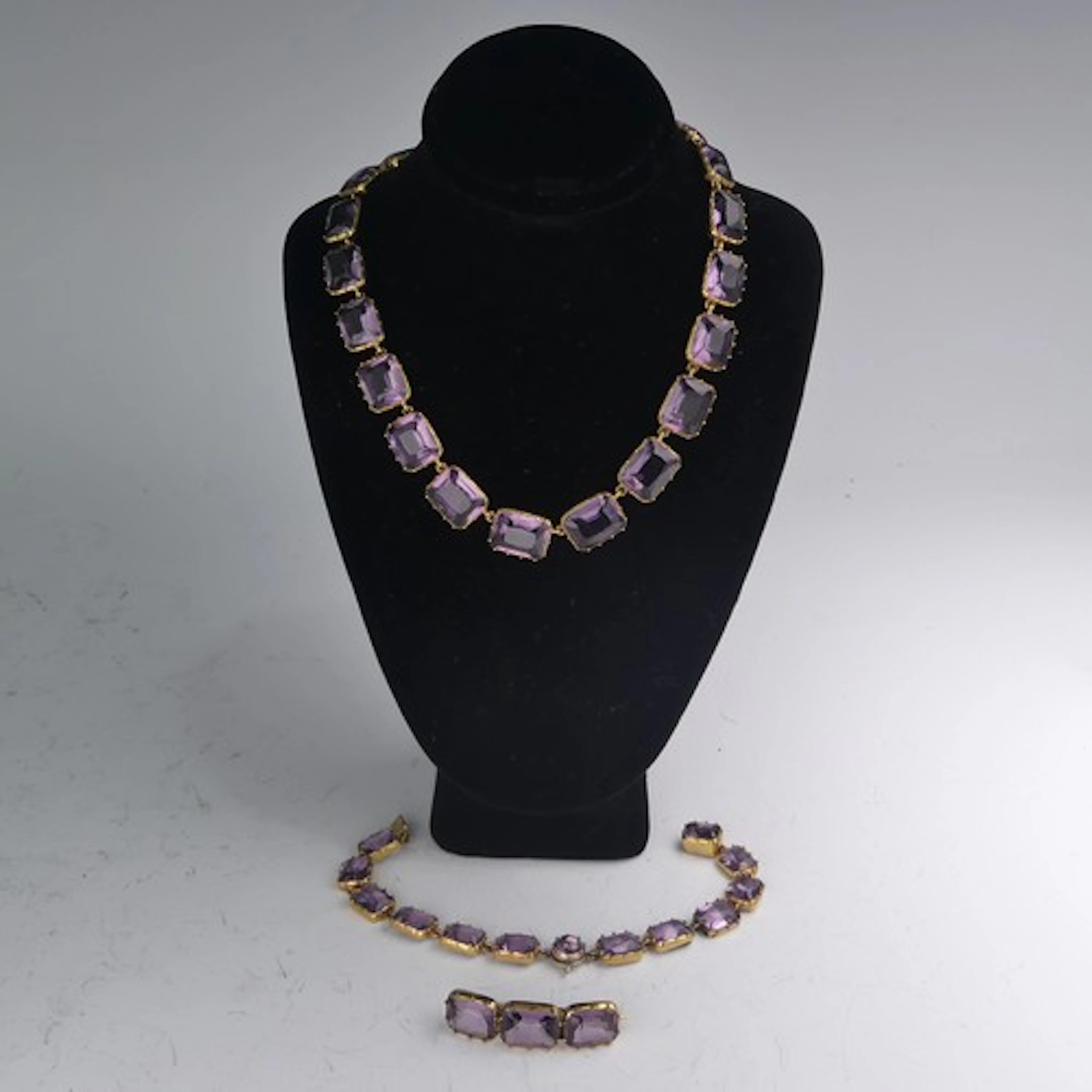 A 19thC amethyst paste riviere Necklace, with twenty nine cu...