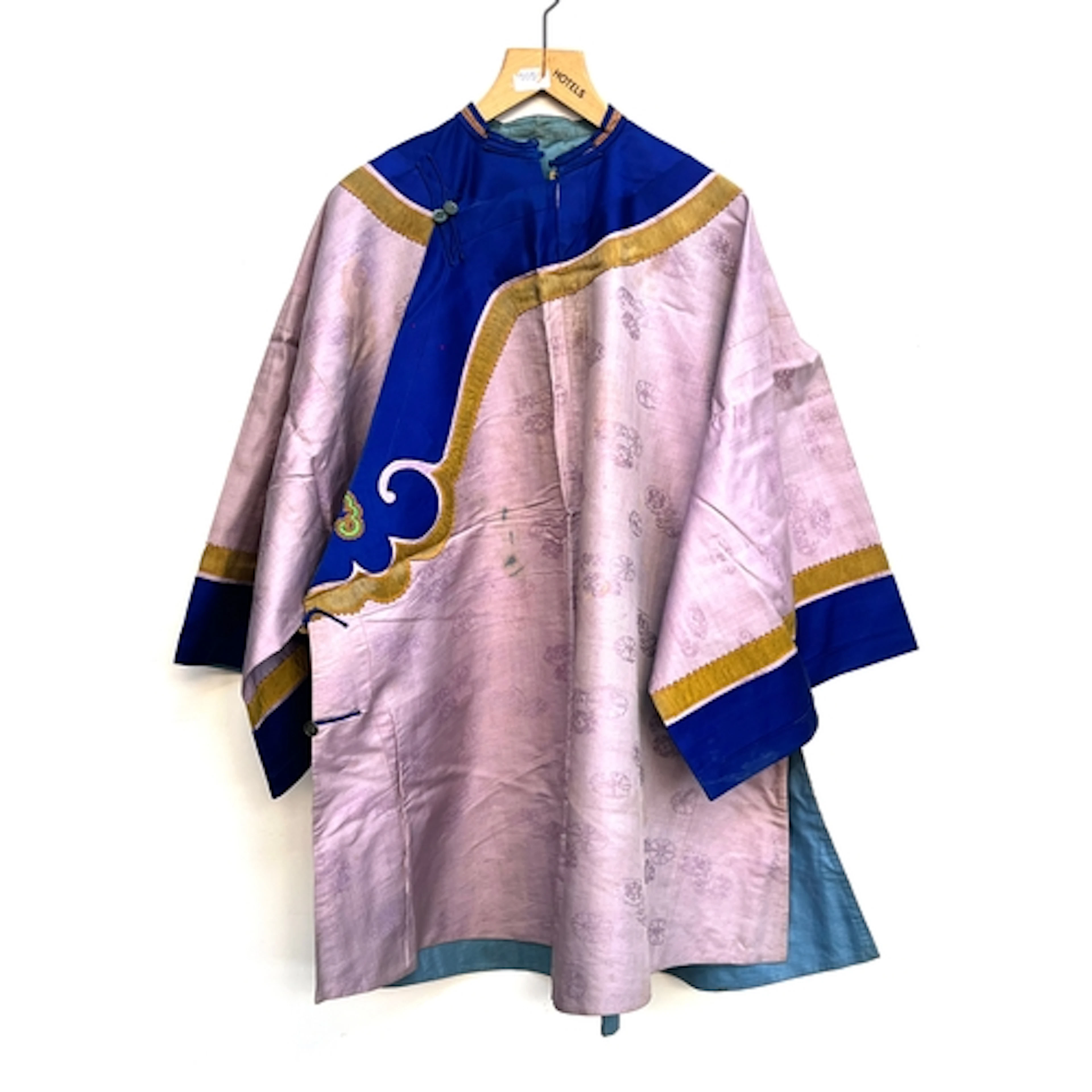An antique Chinese silk robe (af), lavender damask silk with...