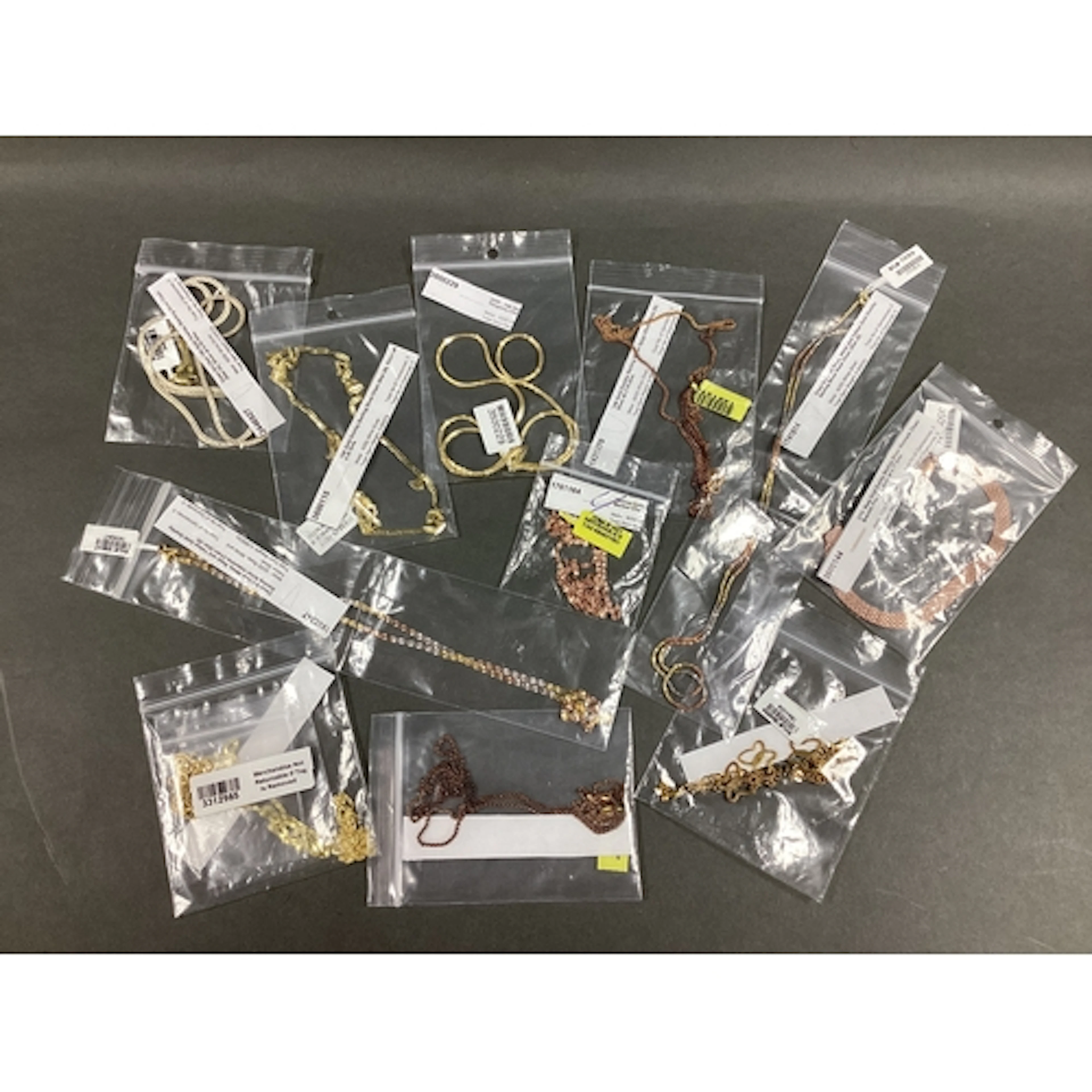 A Selection of Modern Gold Plated Chains and Bracelets, incl...