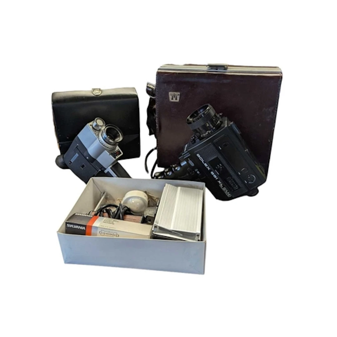 A collection of vintage 20th century cine cameras and access...