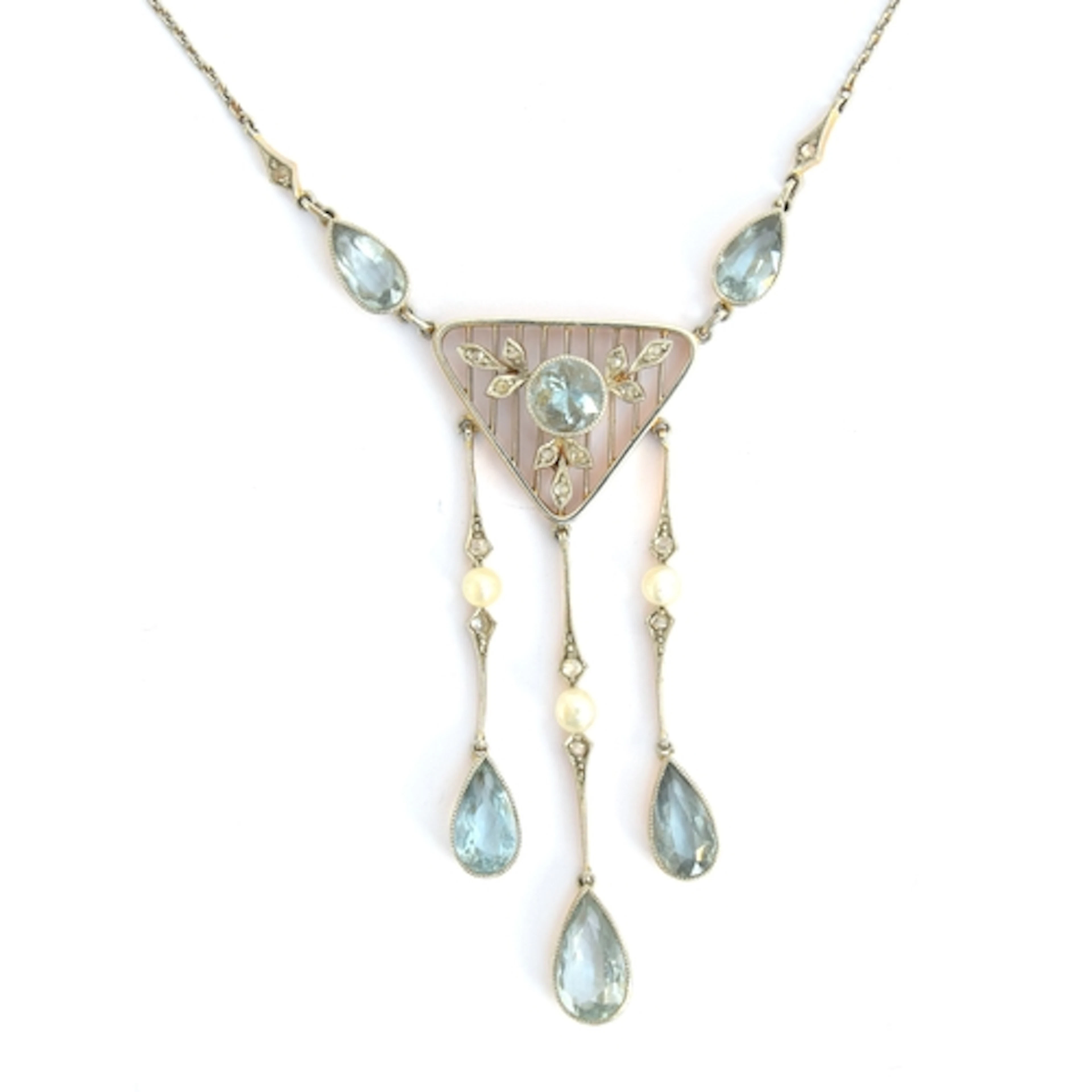 An Edwardian platinum and gold mounted aquamarine lavalier n...