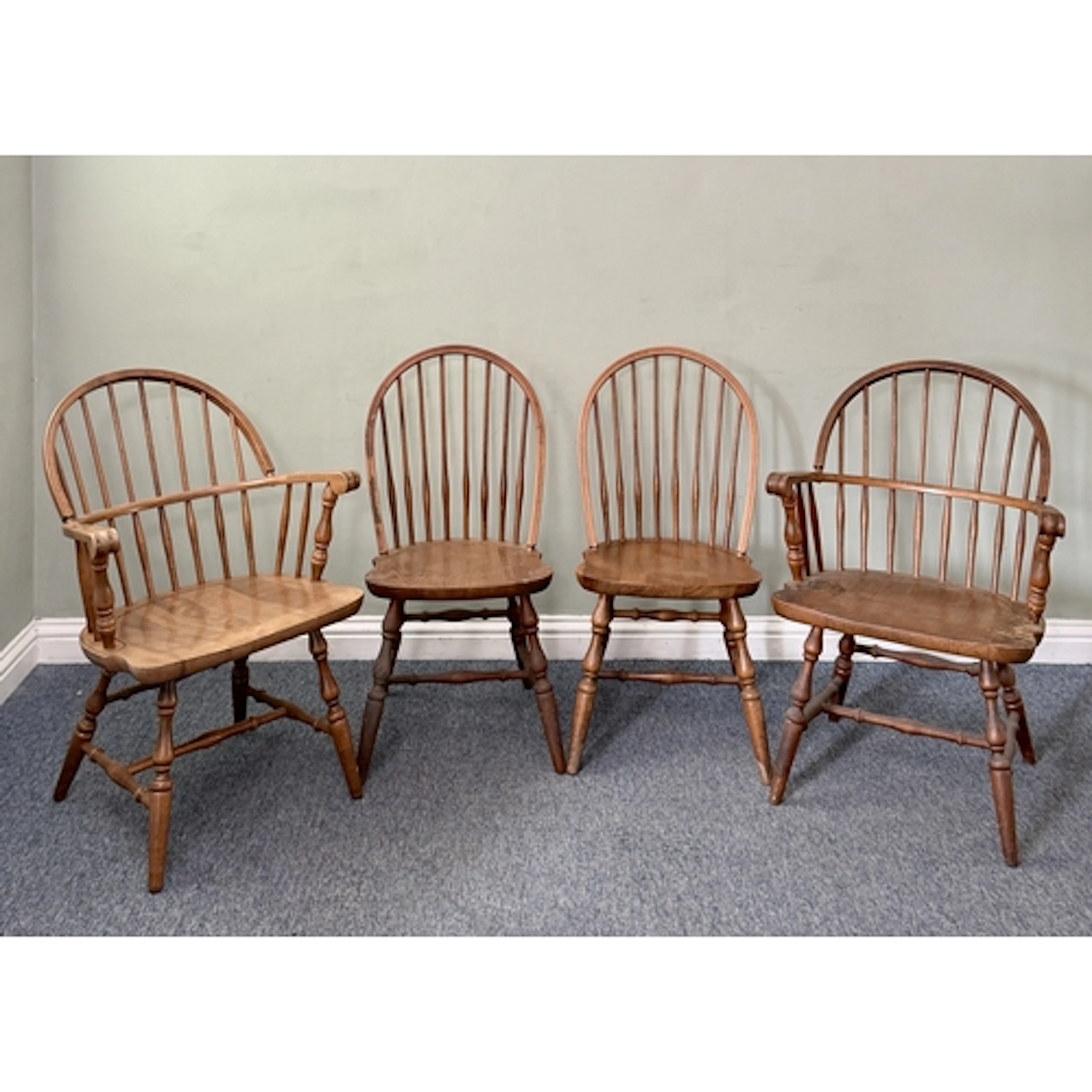A set of four beech Windsor style hoop-back chairs - second ...